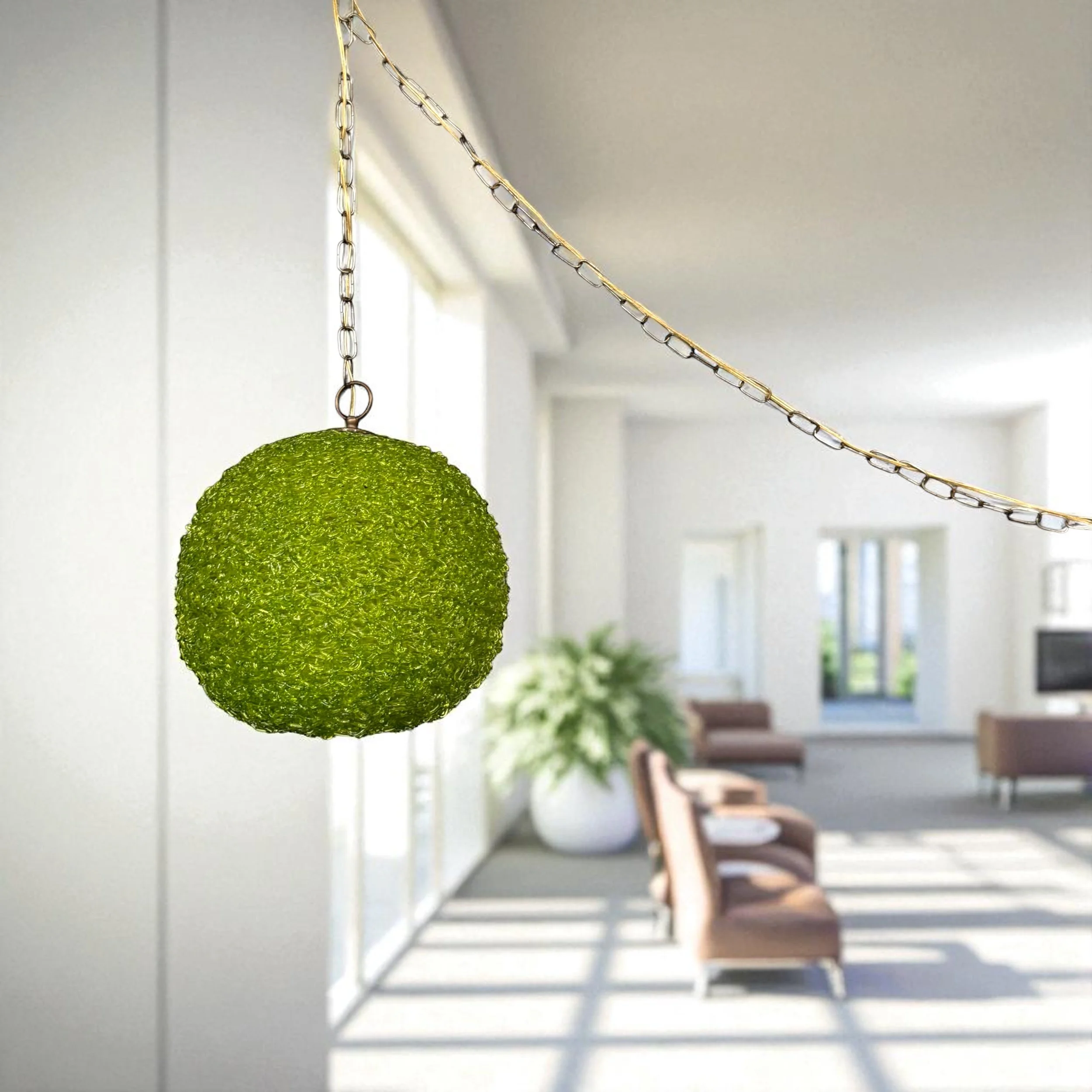 Retro spaghetti lucite globe light hanging in a modern, mid century inspired room
