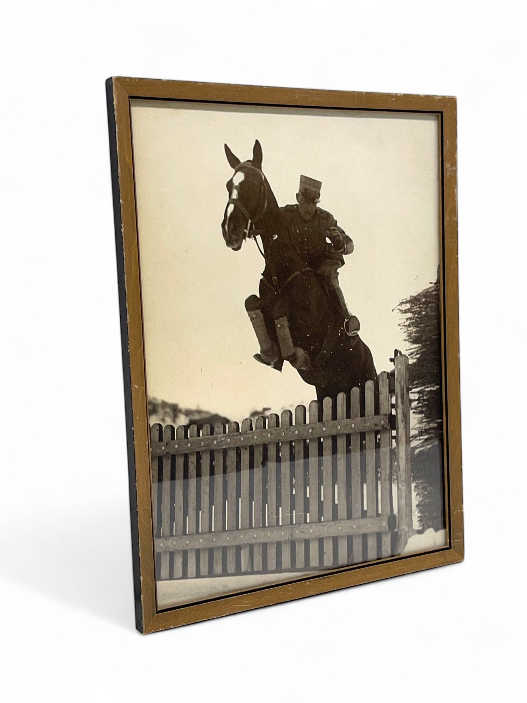 Vintage original photo of military man on horseback jumping fence. Professionally framed. Vertical orientation. Minimalist cabin or lodge wall art.
