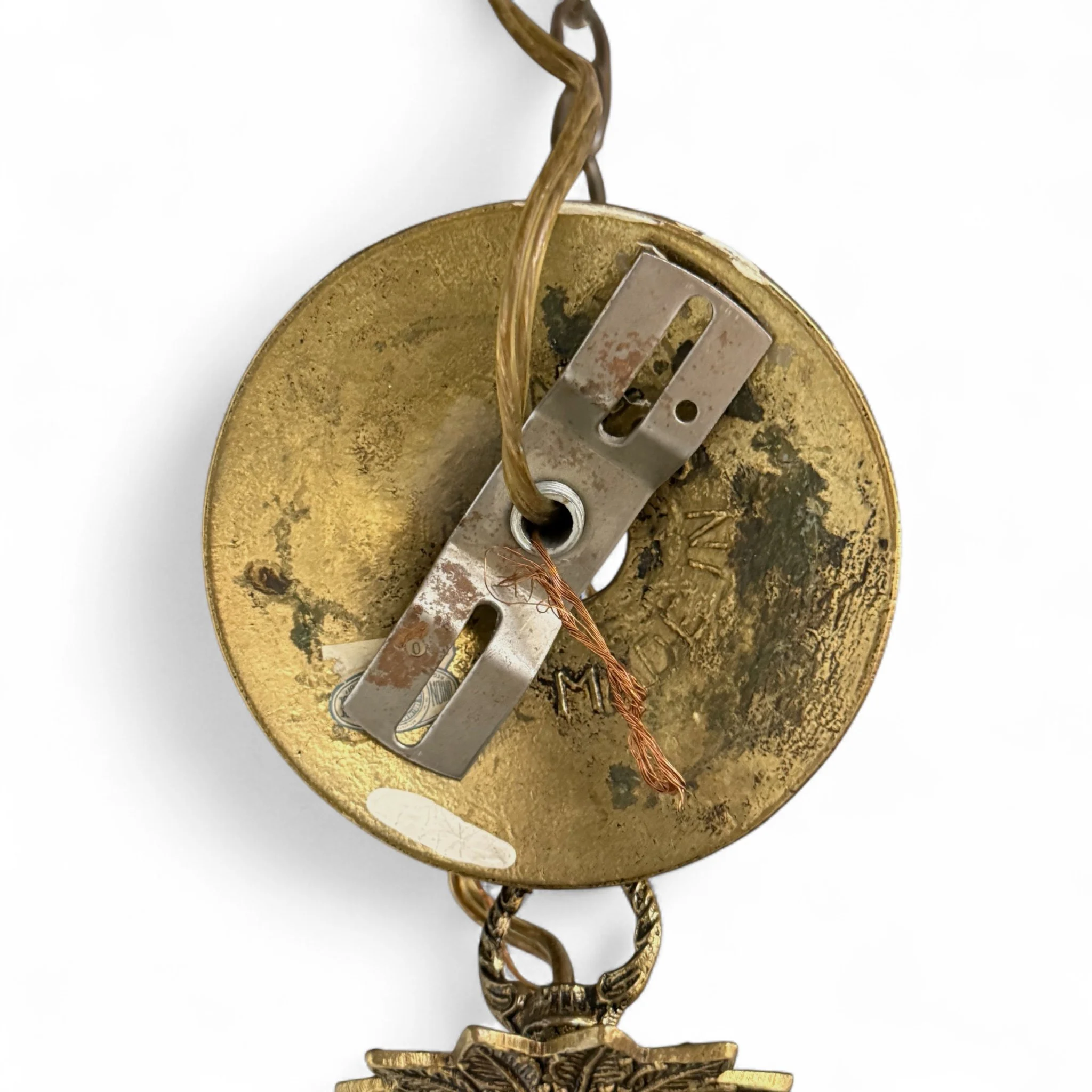 Vintage 1950s brass chandelier with five ornate candelabra arms, plastic drip candle covers, made in Spain, Victorian and Hollywood Regency style.