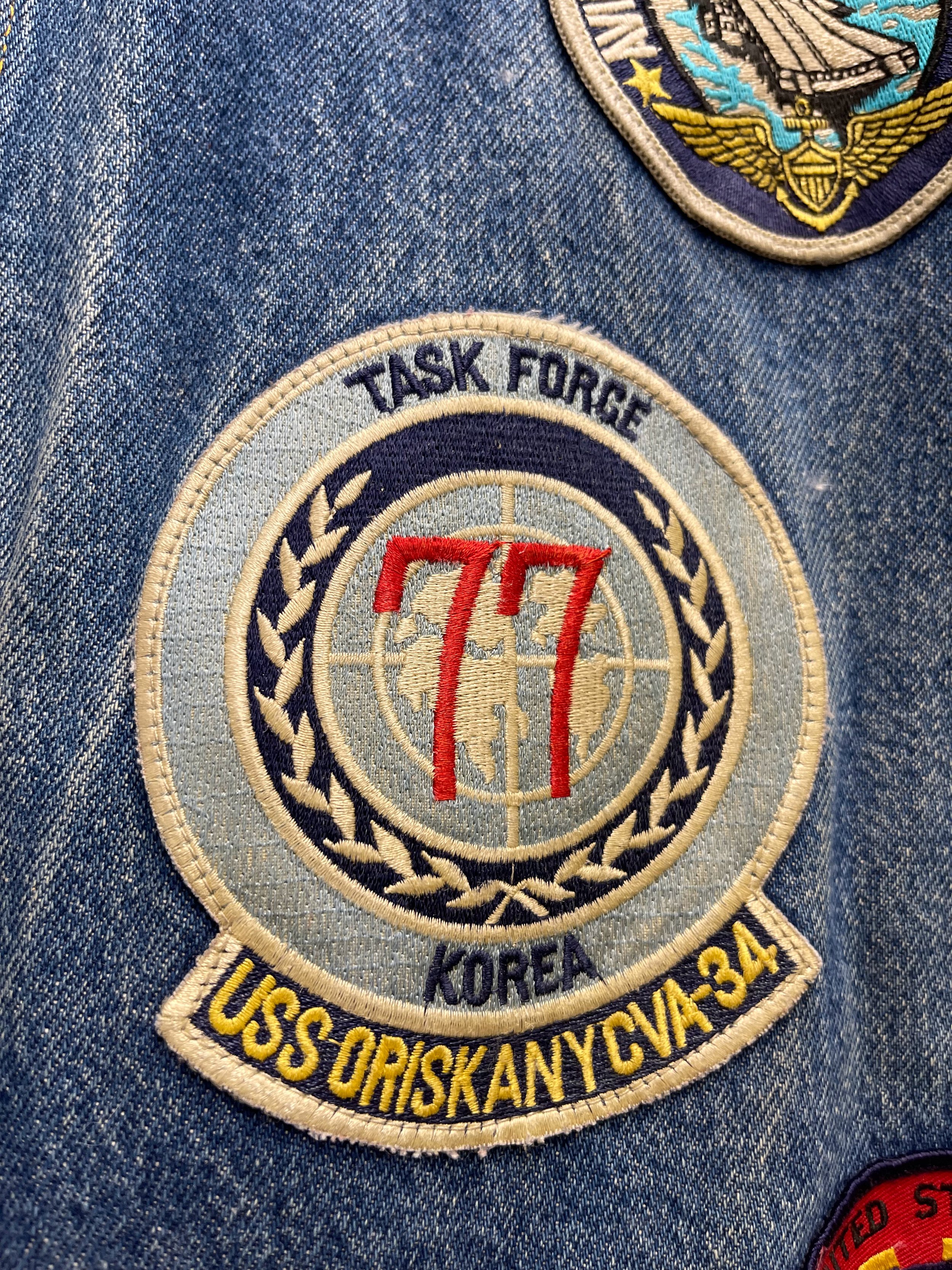 Vintage mens 3XL or 4XL denim vest by SFO San Francisco Overall with vintage military patches.
