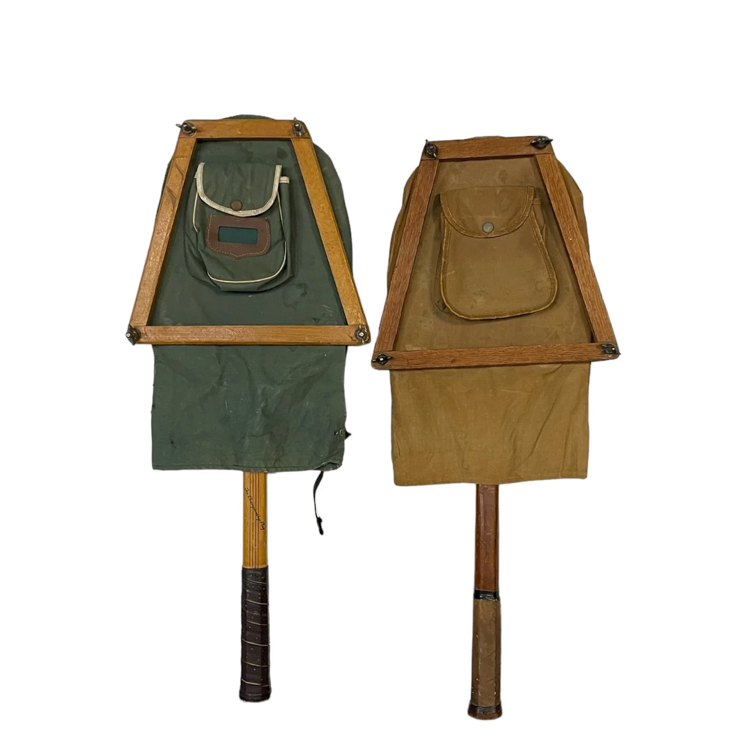 Vintage pair of wooden tennis rackets by Wright & Ditson and Playrite with wood press and canvas covers.