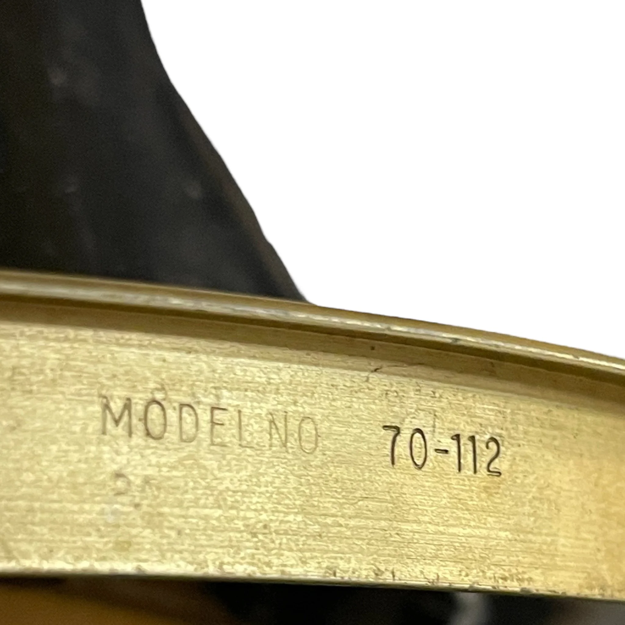 Vintage black firefighter helmet with classic design, an antique fireman collectible perfect for display, gift for fireman memorabilia, or fire department decor.