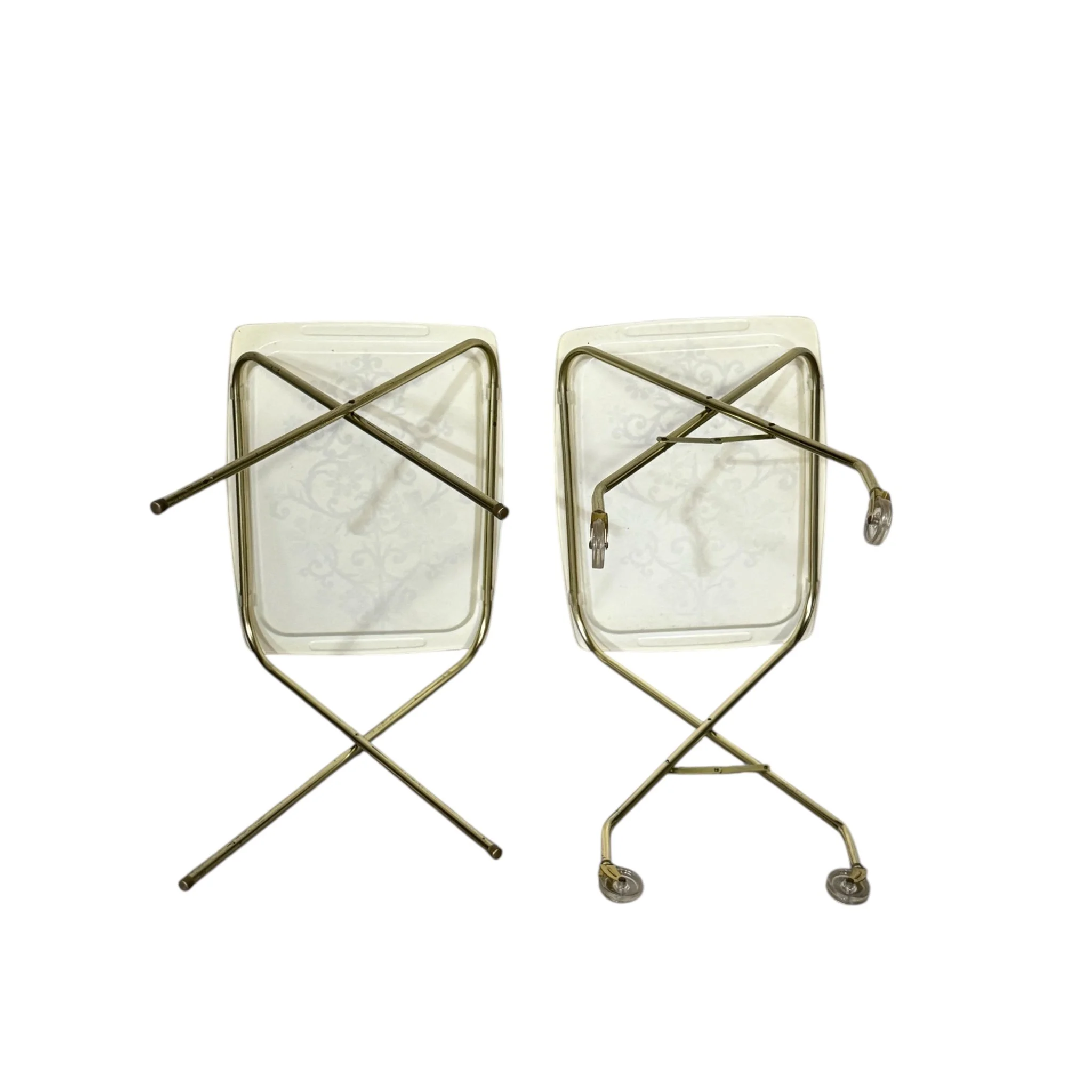 Pair of floral vintage fiberglass mid century folding TV trays with colorful flower design and metal legs.