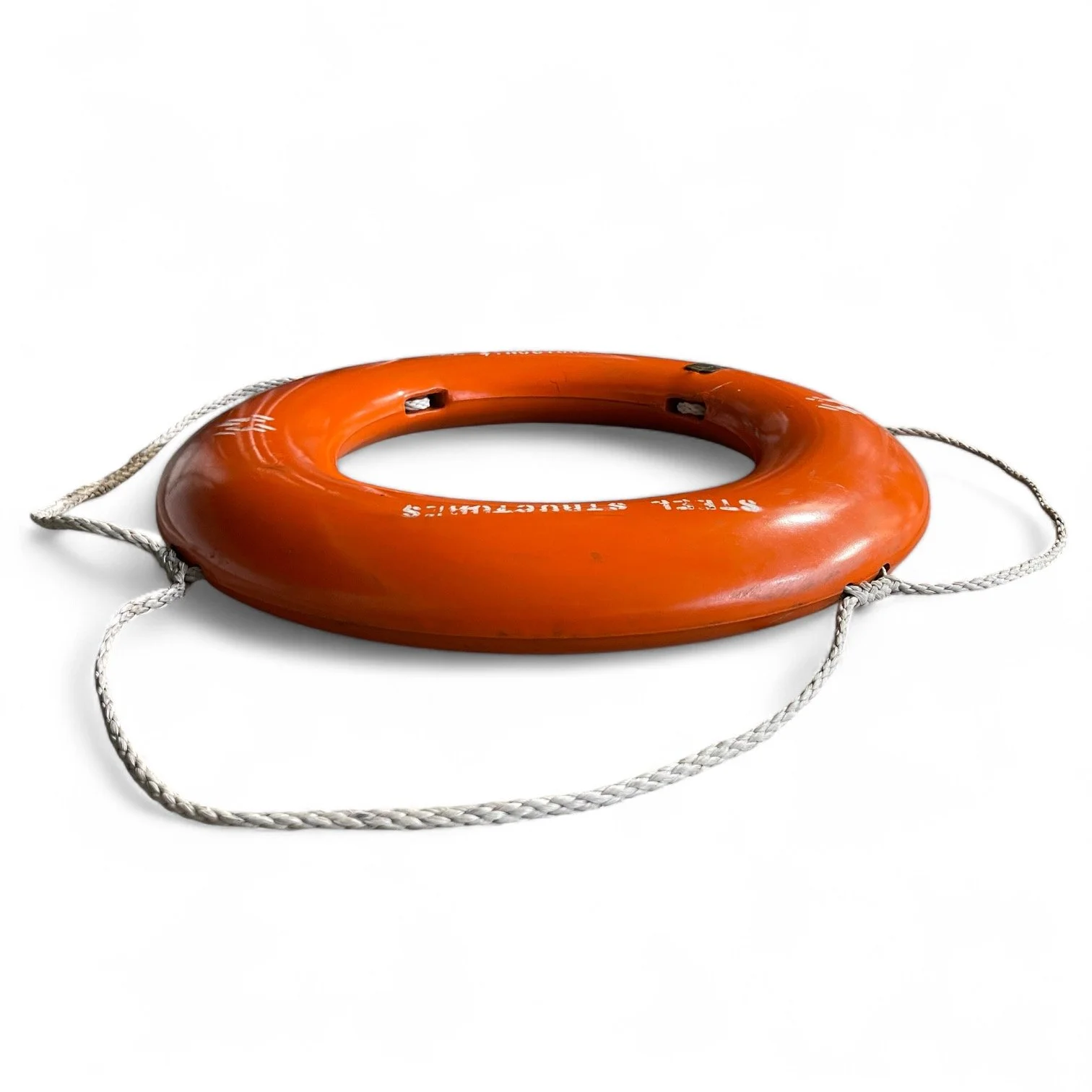 Vintage life preserver buoy, BF Goodrich, manufactured by Tapatco, Inc., 1970s with gold plate, orange with rope.