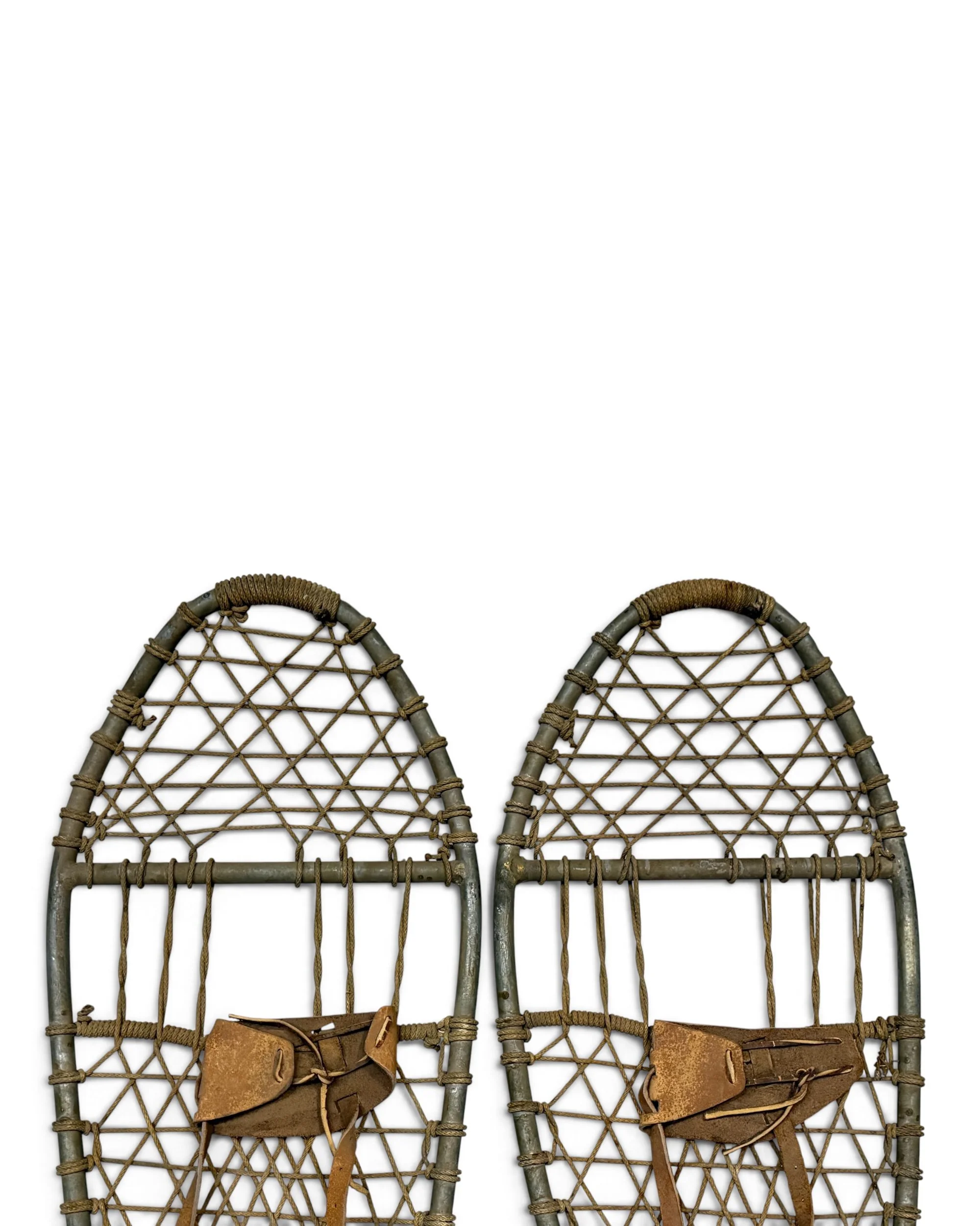 vintage pair metal snowshoes with rope - Modern Artifact DecorPhotoroom_20260929_064405.JPG