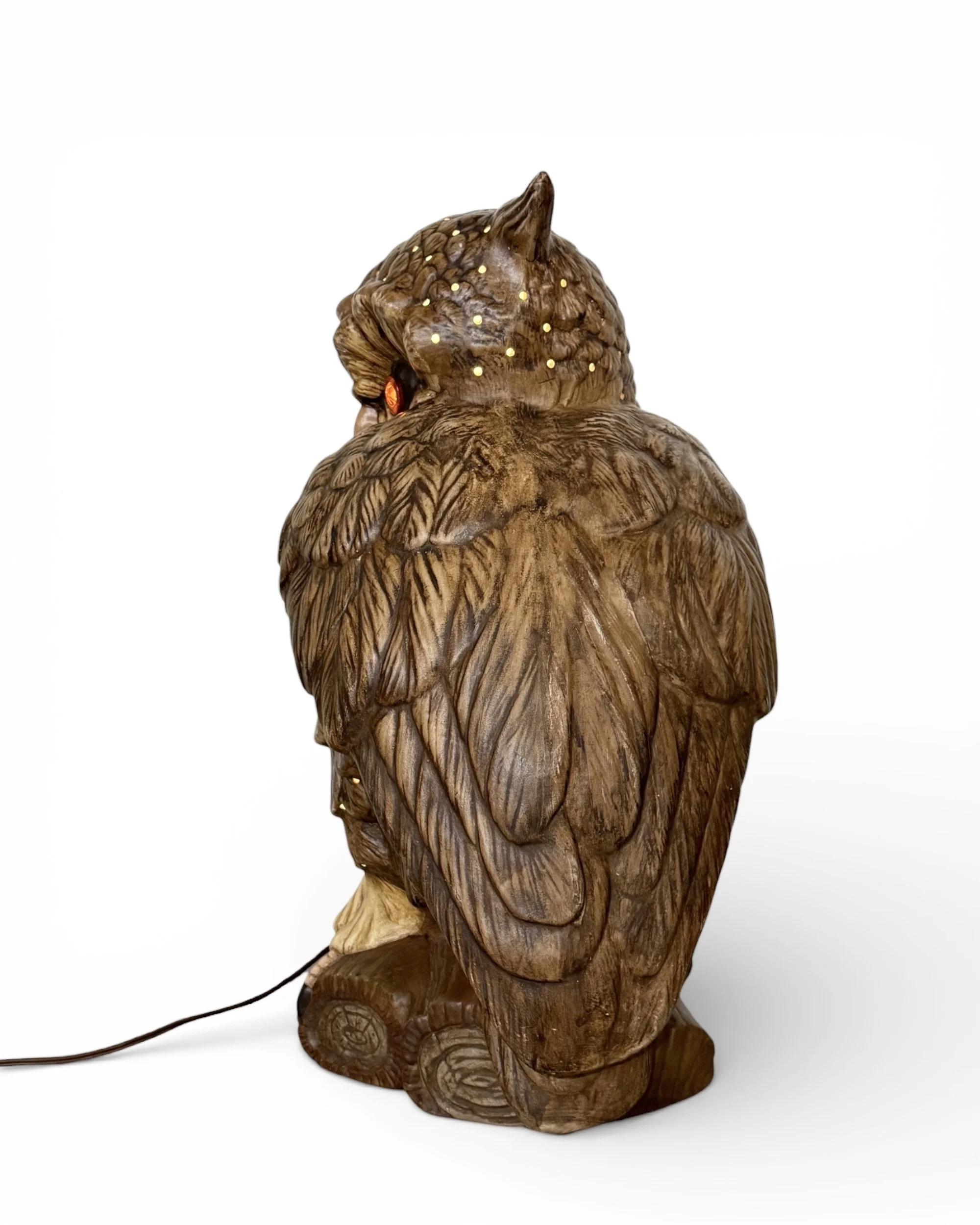 Side profile of 1970s ceramic owl lamp showing sculptural form