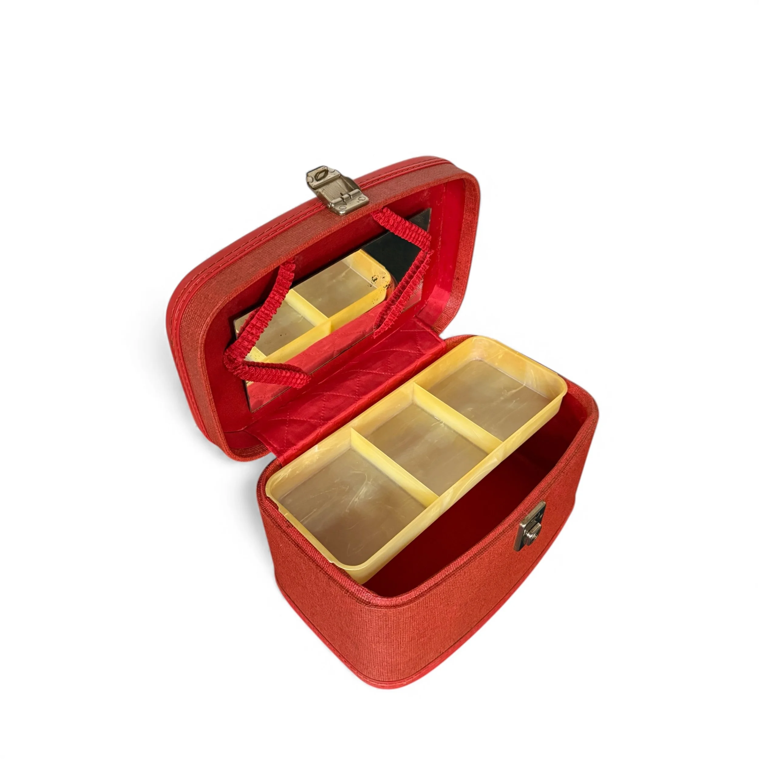 Open view showing divided plastic tray on a retro makeup case