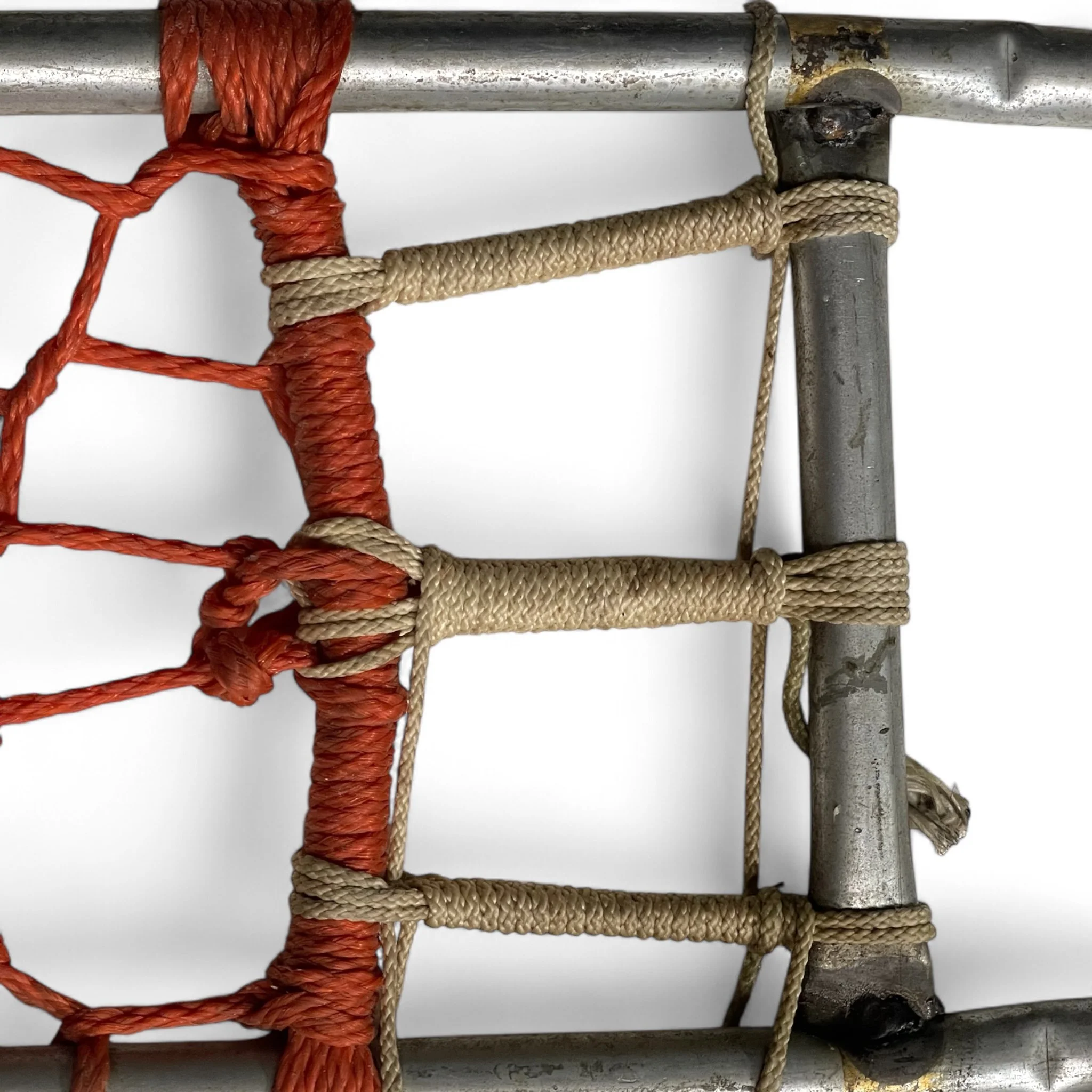 Pair of vintage metal snowshoes with orange and beige rope, perfect for rustic cabin decor, ski lodge wall art, or winter inspired home accents.
