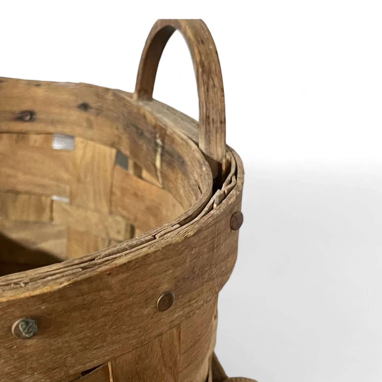 Close up view of a large vintage Adirondack Pack Basket - 2 Compartments, 1 with lid, canvas adjustable shoulder straps.