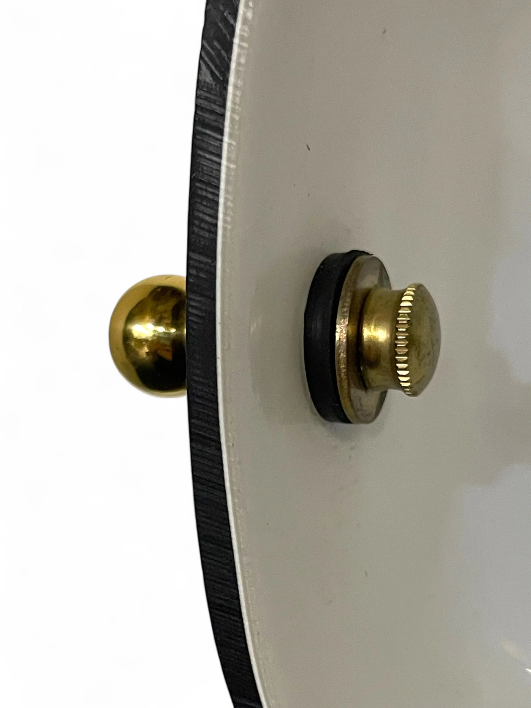 Close up of a vintage bankers desk lamp featuring a sleek black glass shade, fully adjustable, round marble base, perfect for classic office lighting or Art Deco style decor.