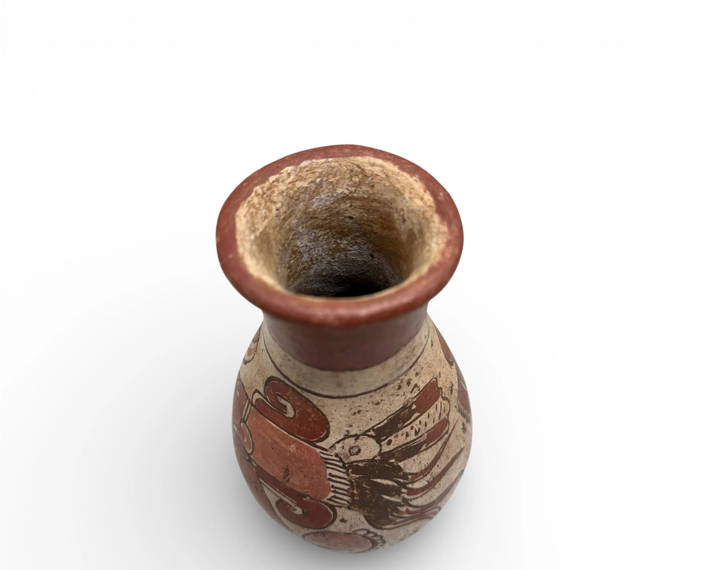 Top view of vintage Mesoamerican inspired ceramic vessel with narrow neck