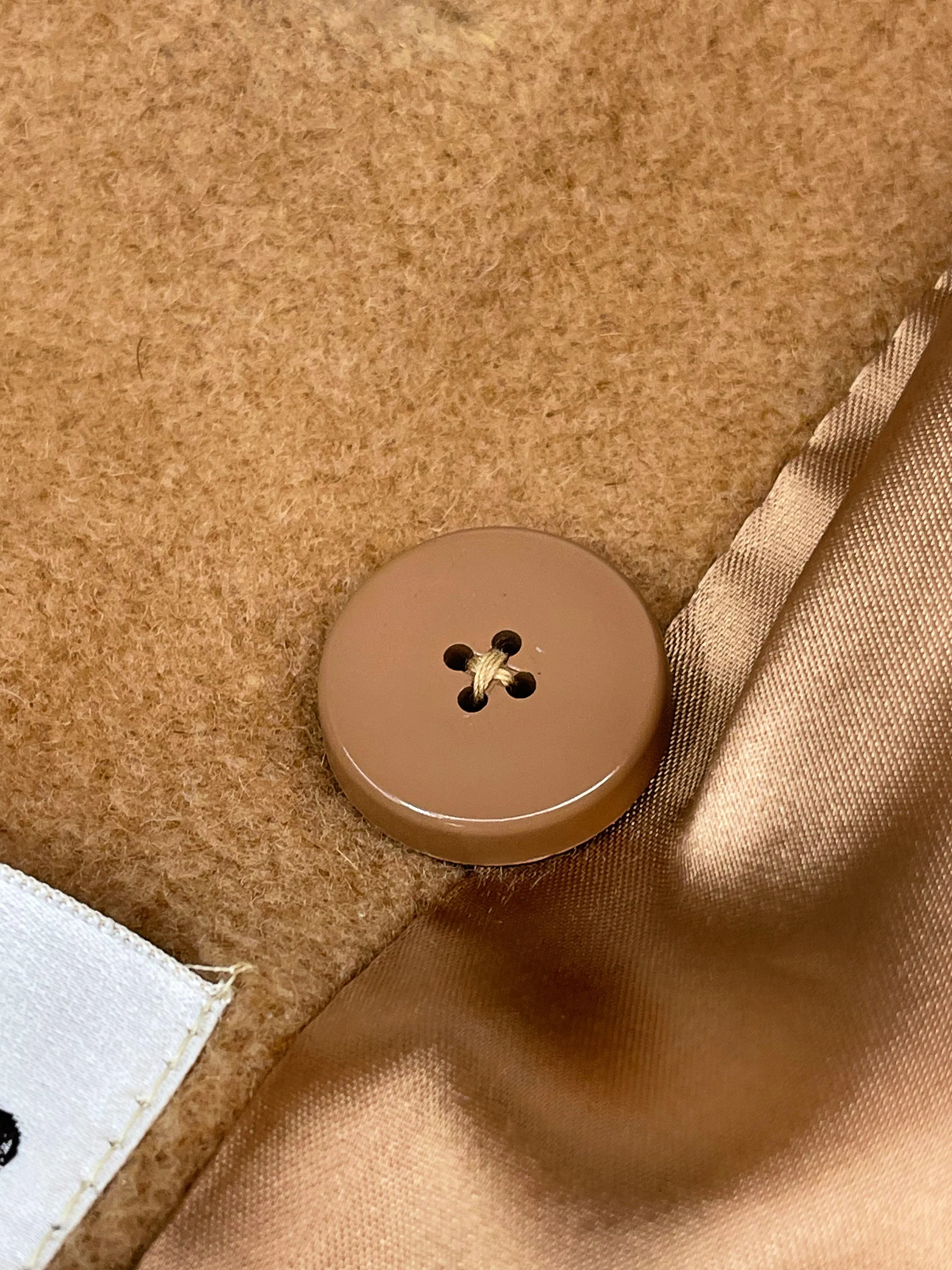 Vintage womens fully lined double breasted button front camel hair coat by JJ ODonnell for Montgomery Ward.