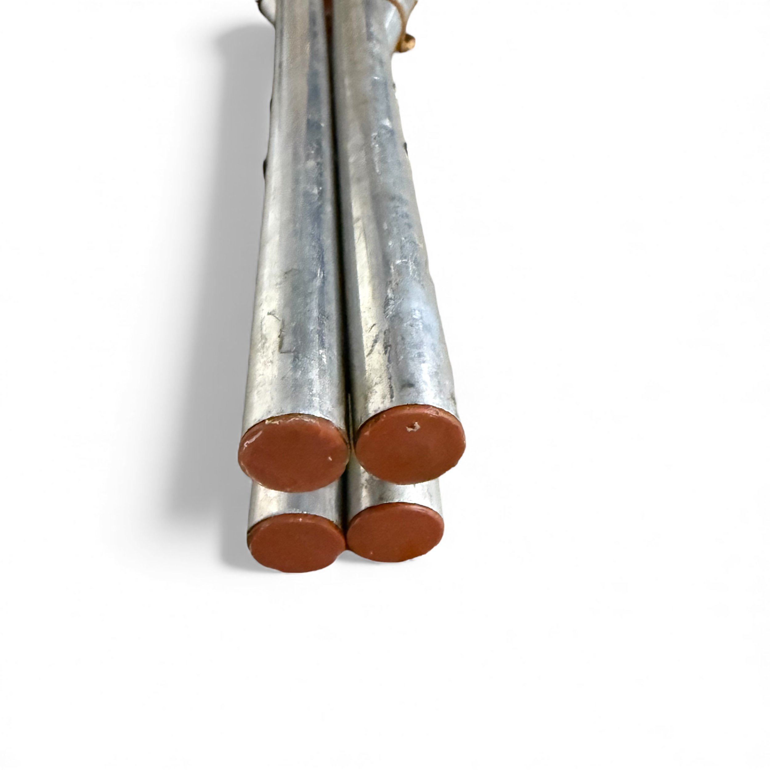 Close up view of metal handles on pair of vintage snowshoes