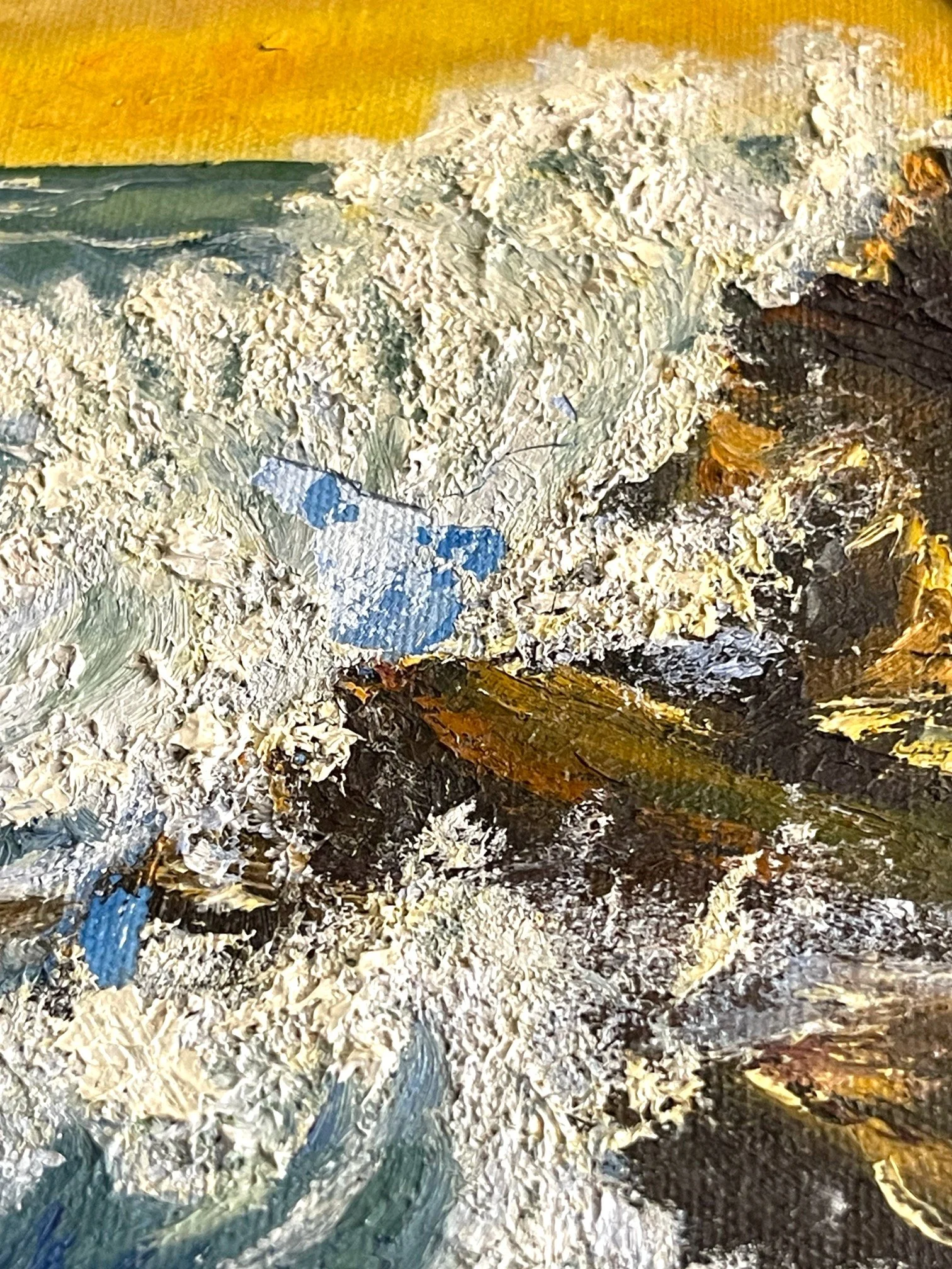 Vintage 1970s original oil painting of ocean waves crashing into a rock cliff with a seagull at sunset, framed in a unique ornate wooden oval frame, stretched canvas. Signed and dated by artist.