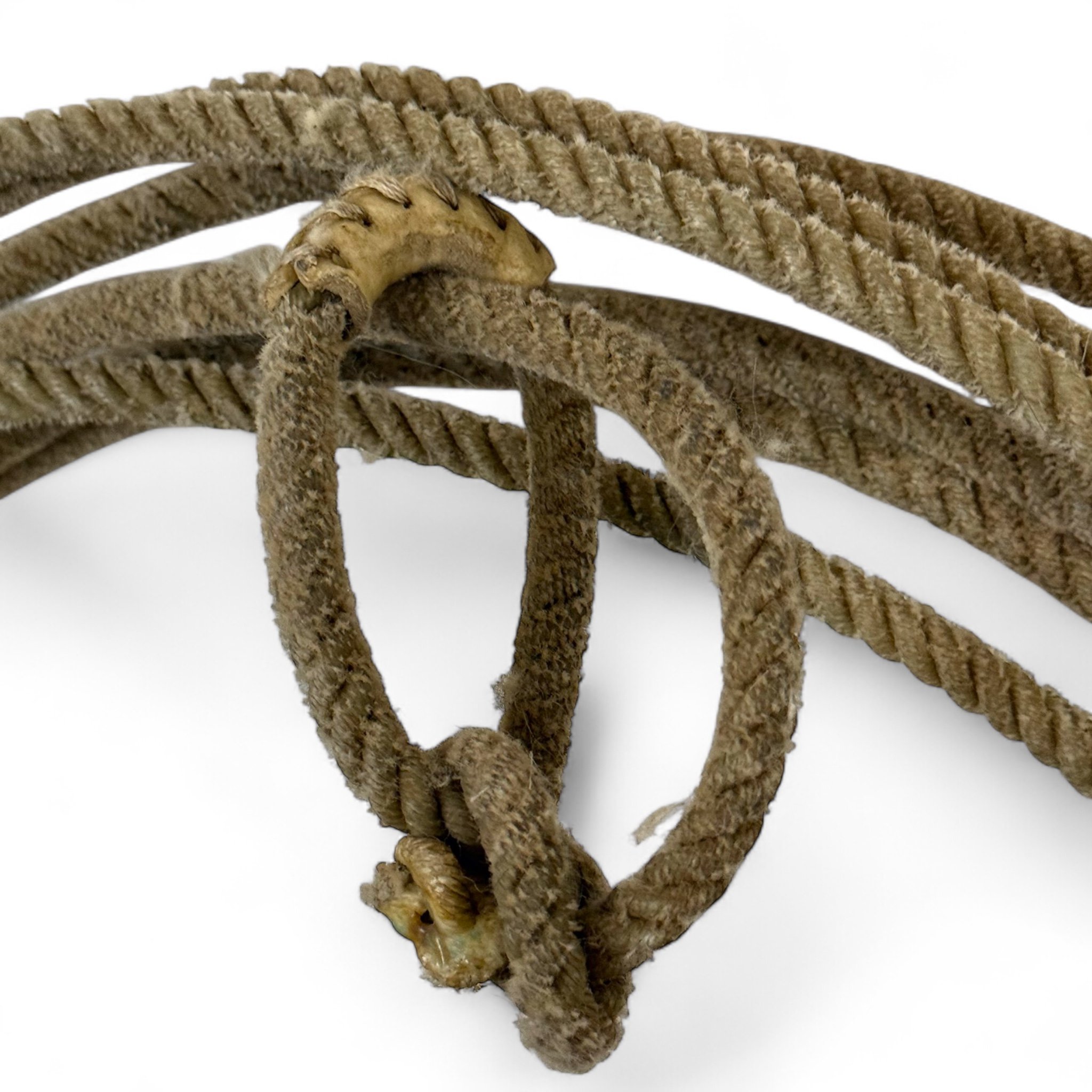 Vintage cowboy lasso rope with rustic patina, perfect for Western decor, rodeo collectors, or ranch style displays. Classic old west cowboy lariat with authentic wear and character.