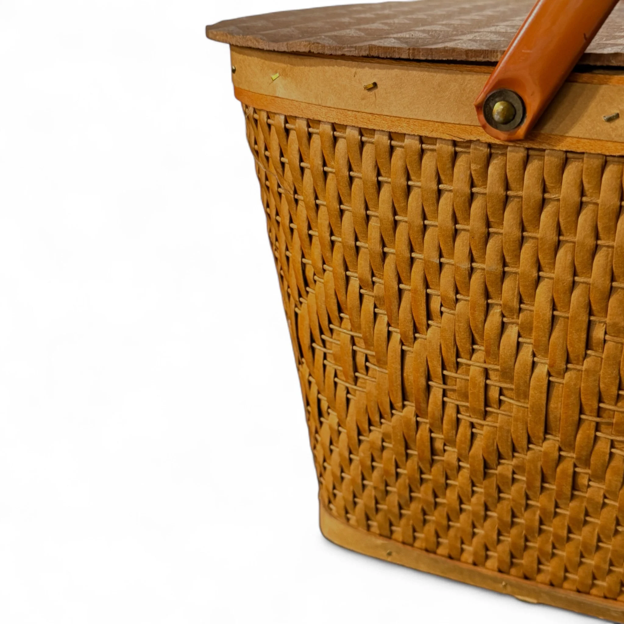 Vintage Red-Man wicker picnic basket with hinged lid and metal handles. ideal for mid century decor, storage, or outdoor gatherings.