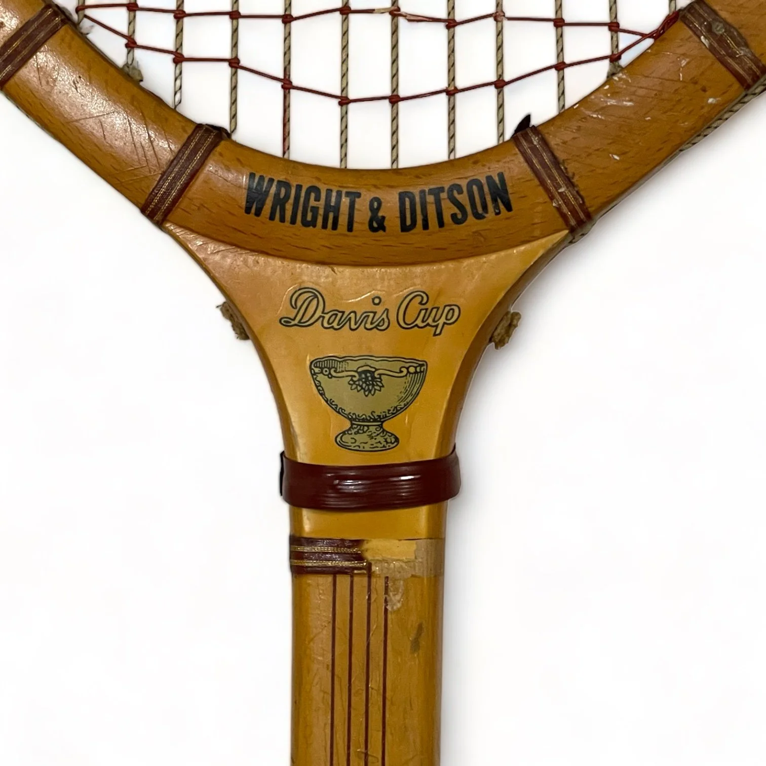 Vintage pair of wooden tennis rackets by Wright & Ditson and Playrite with wood press and canvas covers.