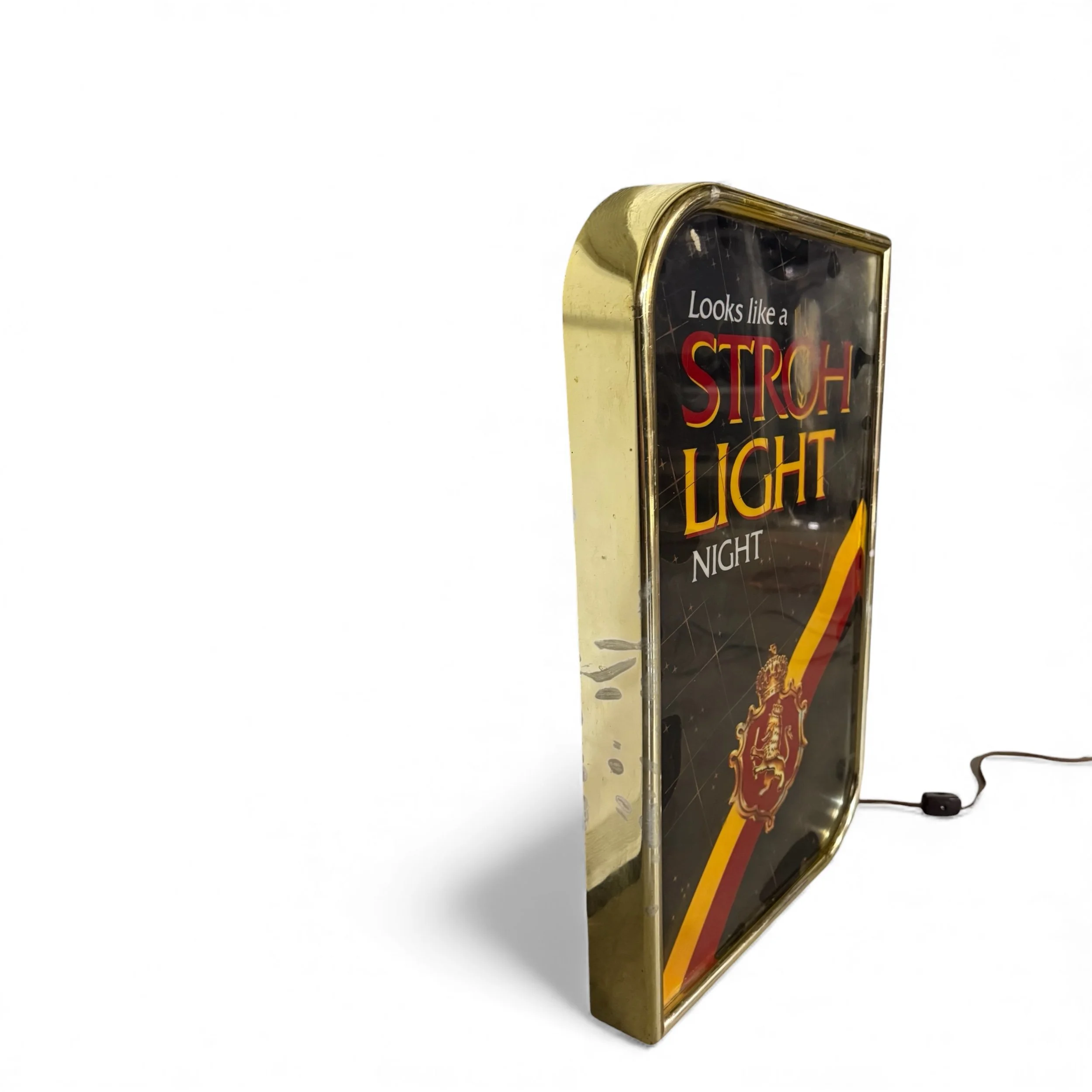Side view of vintage Stroh Light illuminated beer sign, gold frame, black, red, orange colors shown off