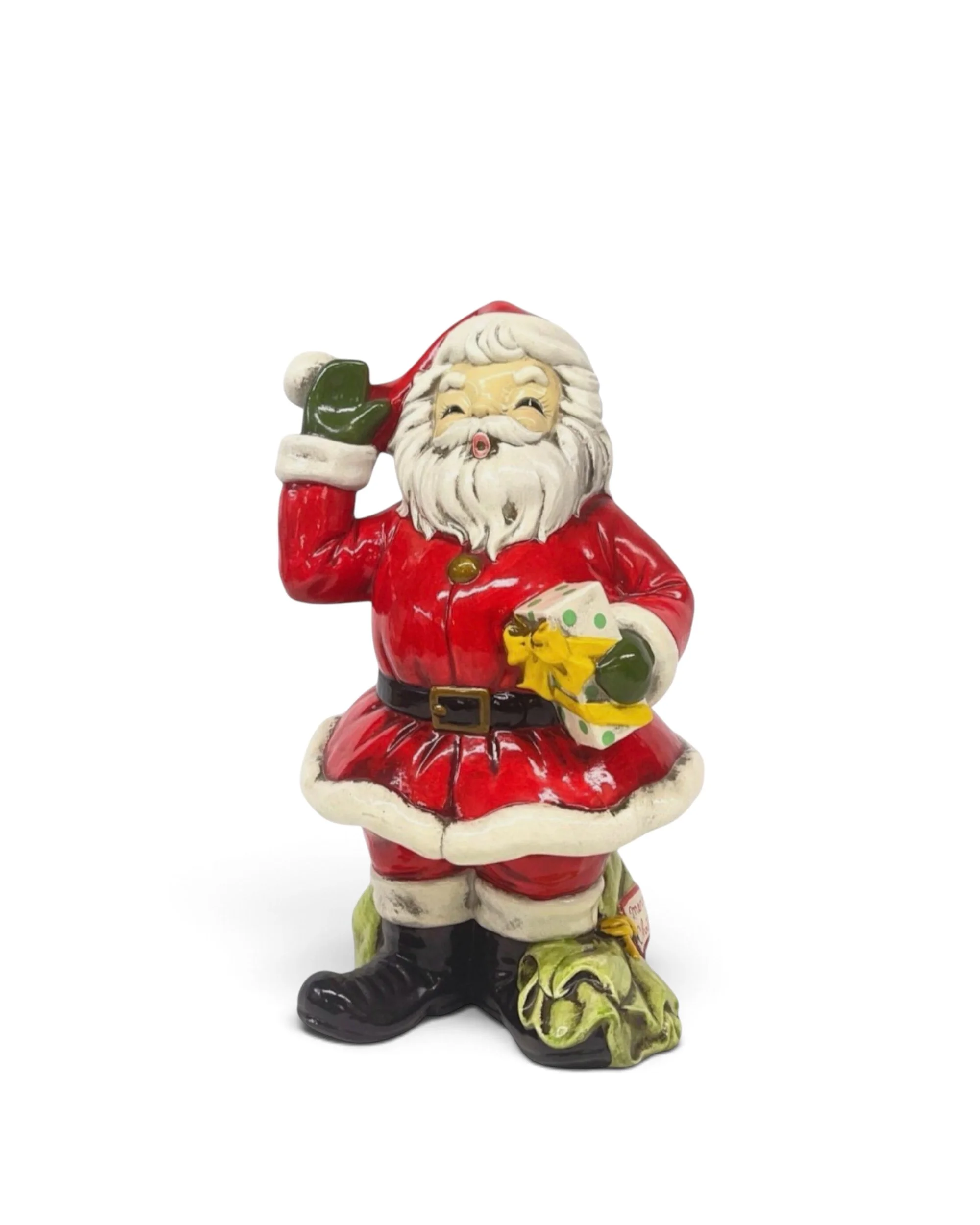 Large vintage Josef ceramic Santa Claus statue in his traditional red suit carrying a bag of toys.