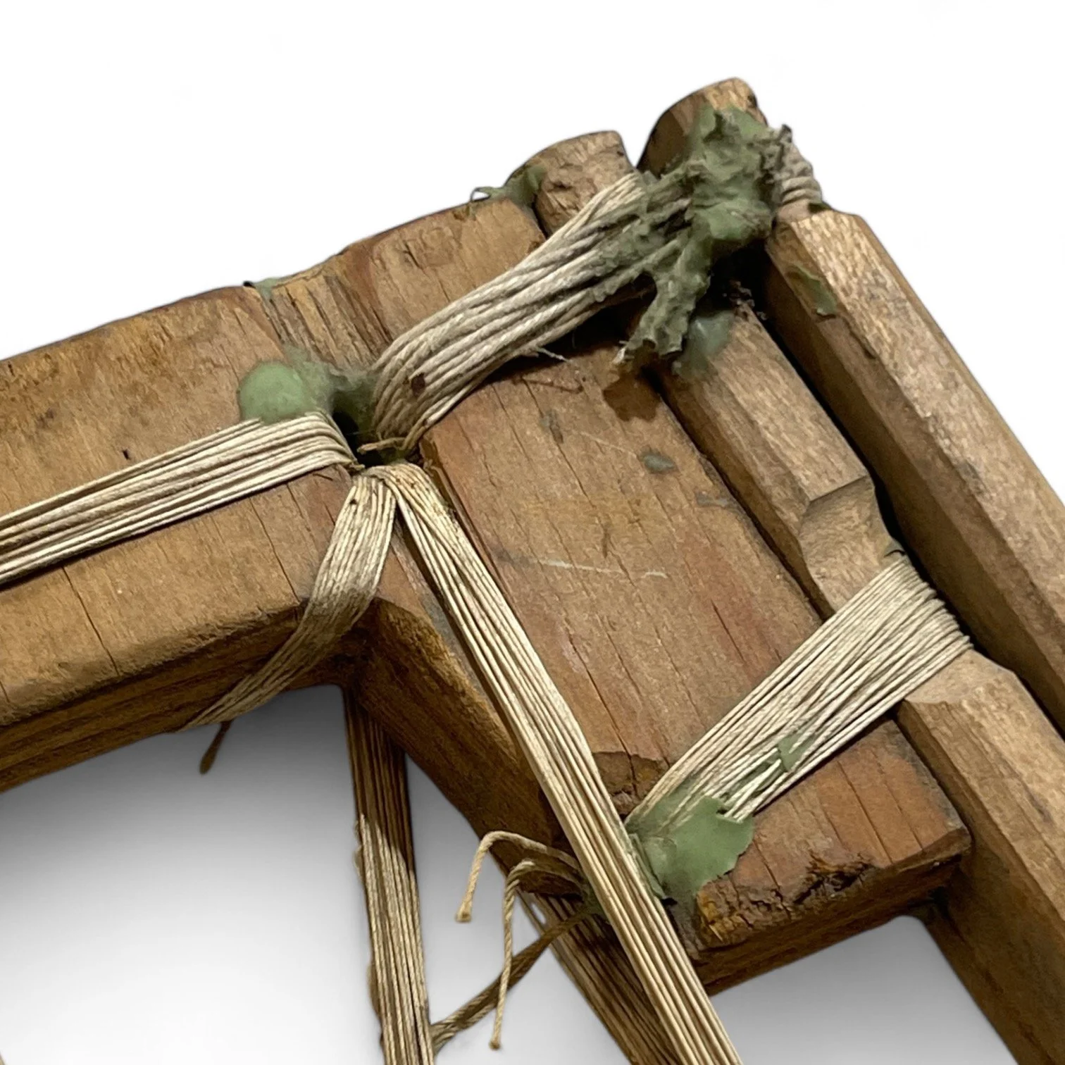 Rare and unique handcrafted vintage wooden snowshoes, featuring square toe frame, string, leather bindings.