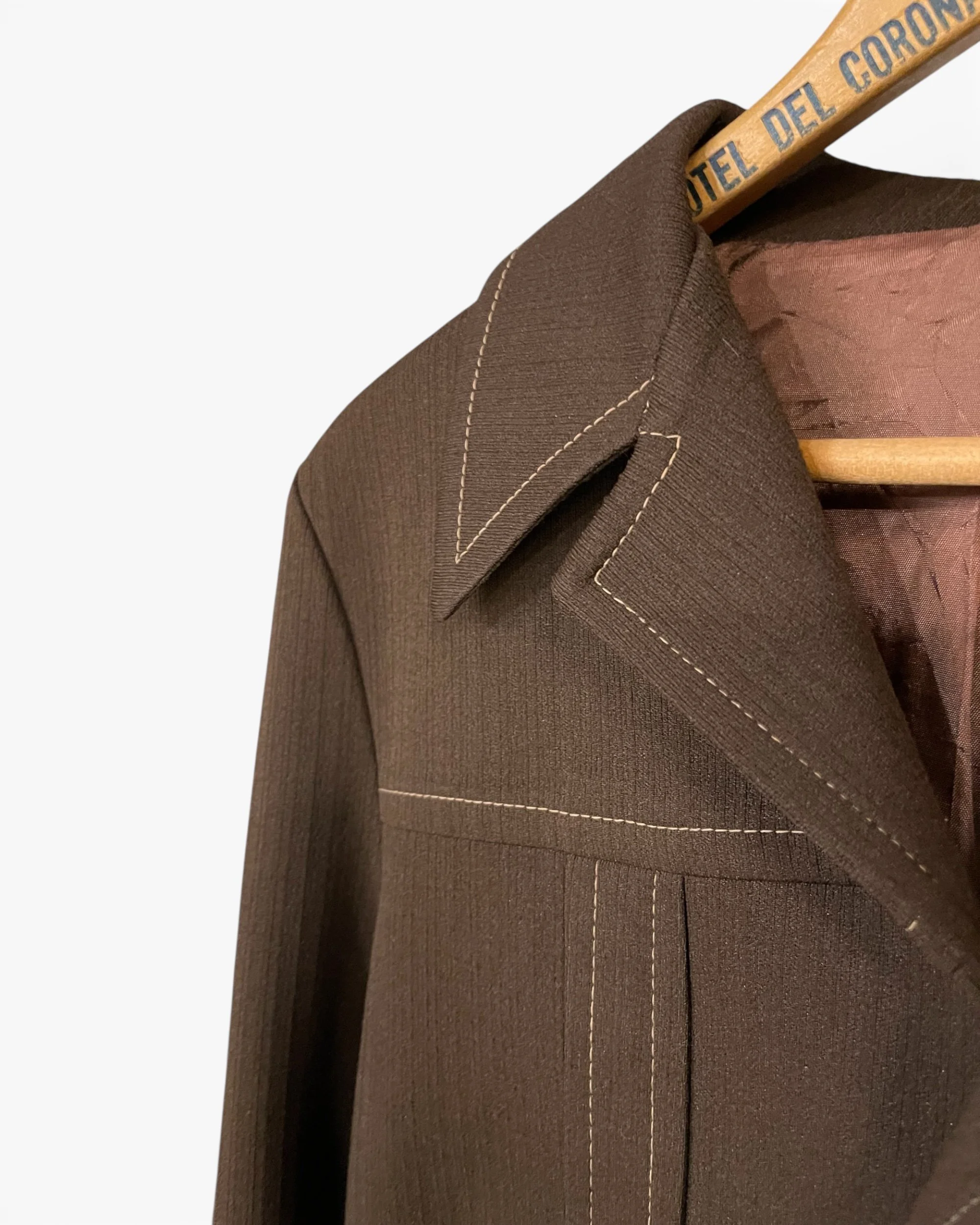 Brown vintage blazer collar and stitching close up