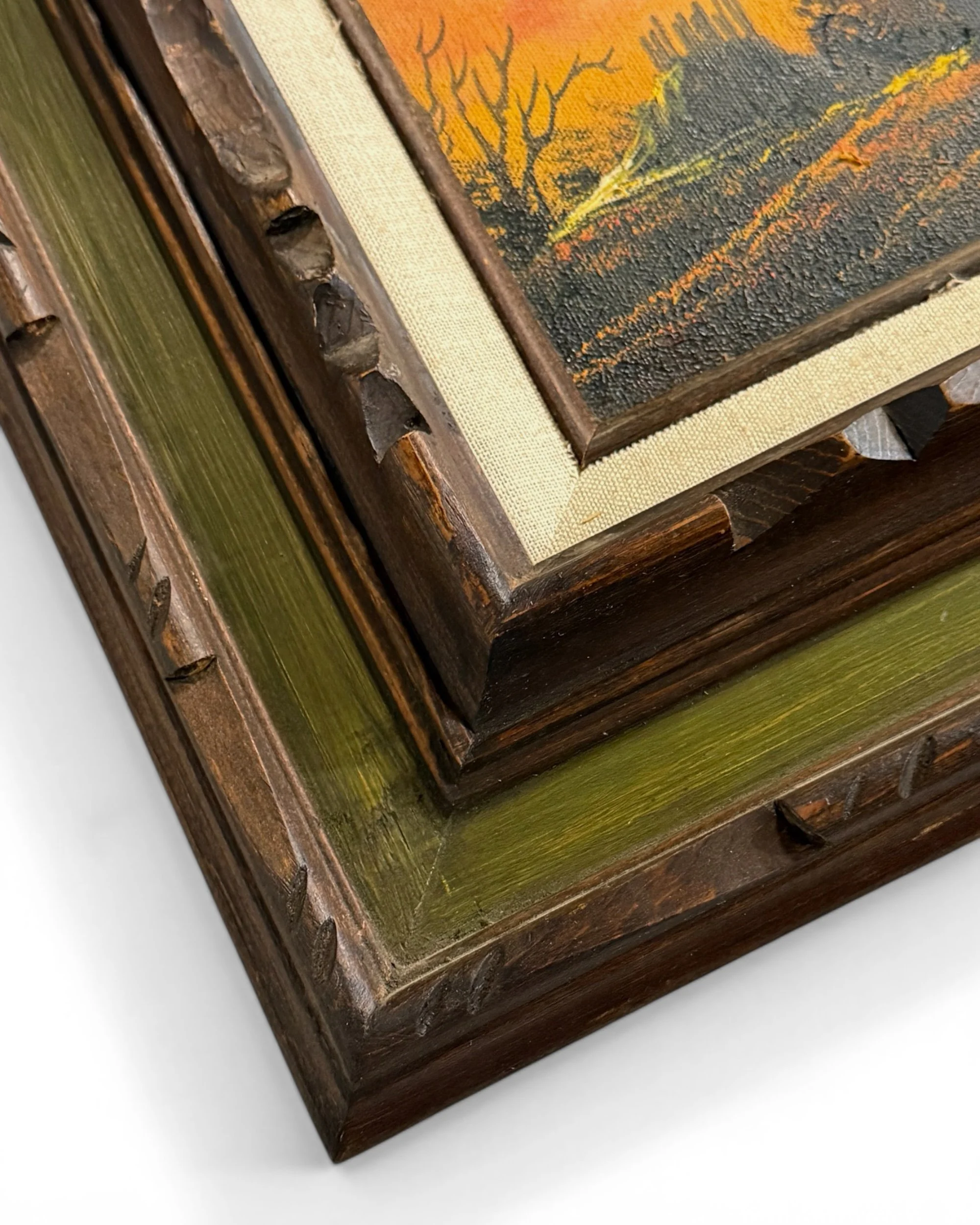 close up of vintage ornate carved wooden framed on original painting