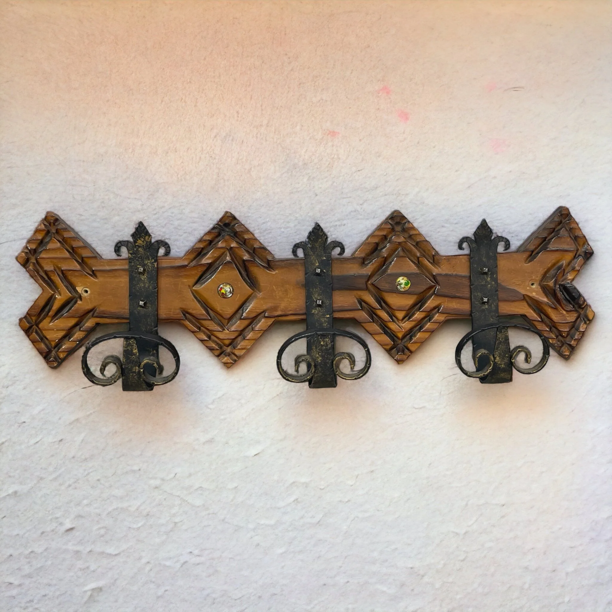 Vintage Spanish Revival style, wood and wrought iron, wall mount coat or towel rack.