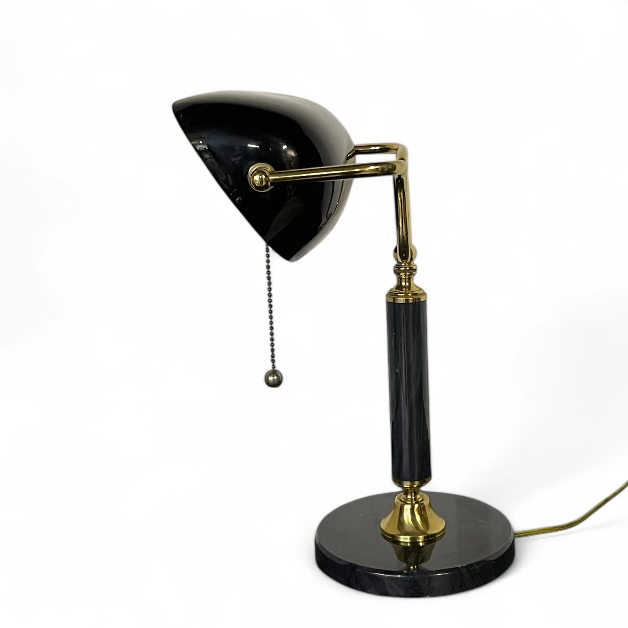Close up of a vintage bankers desk lamp featuring a sleek black glass shade, fully adjustable, round marble base, perfect for classic office lighting or Art Deco style decor.