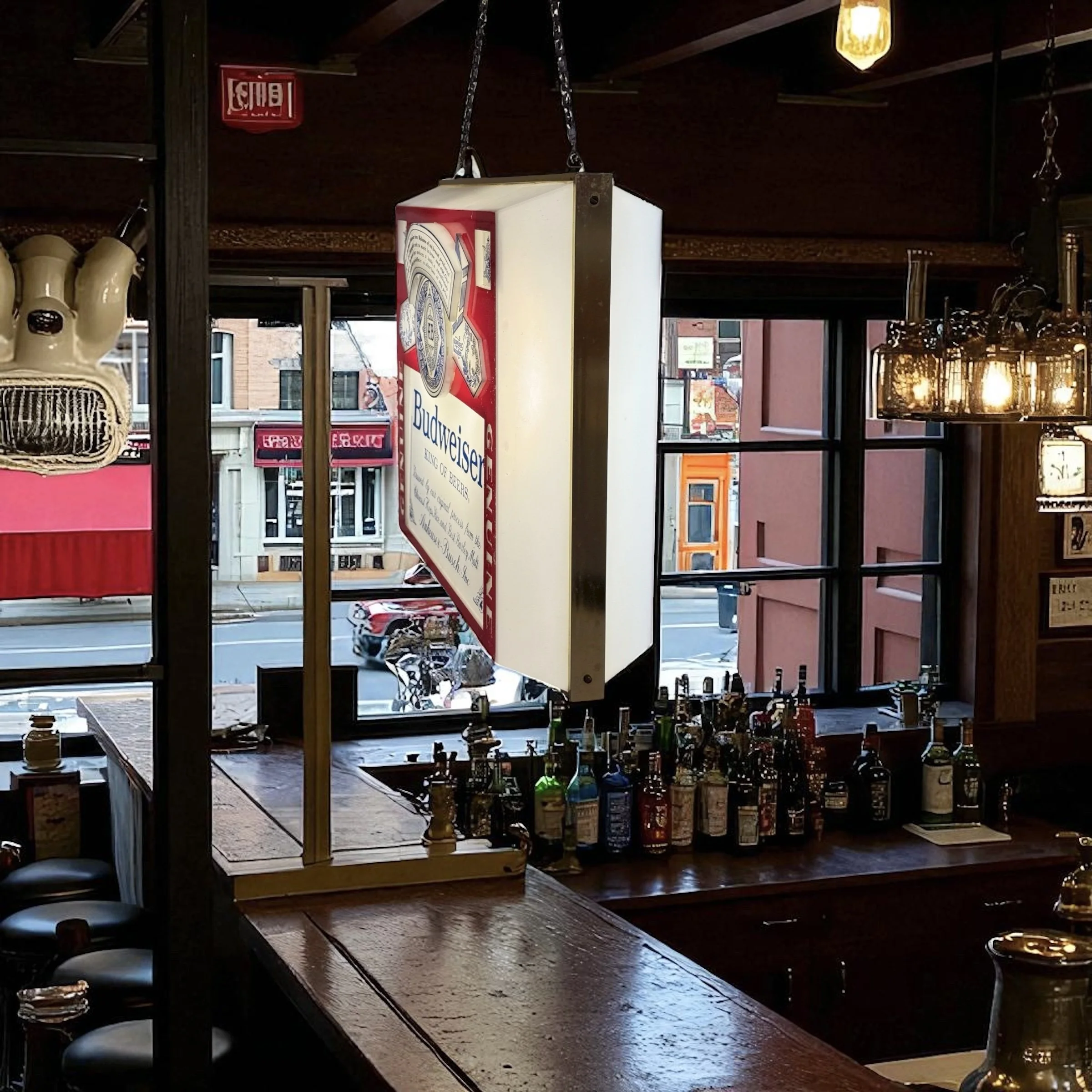 Vintage Budweiser double sided hanging light with chain, square 3D bar hanging from the ceiling of a classic American bar