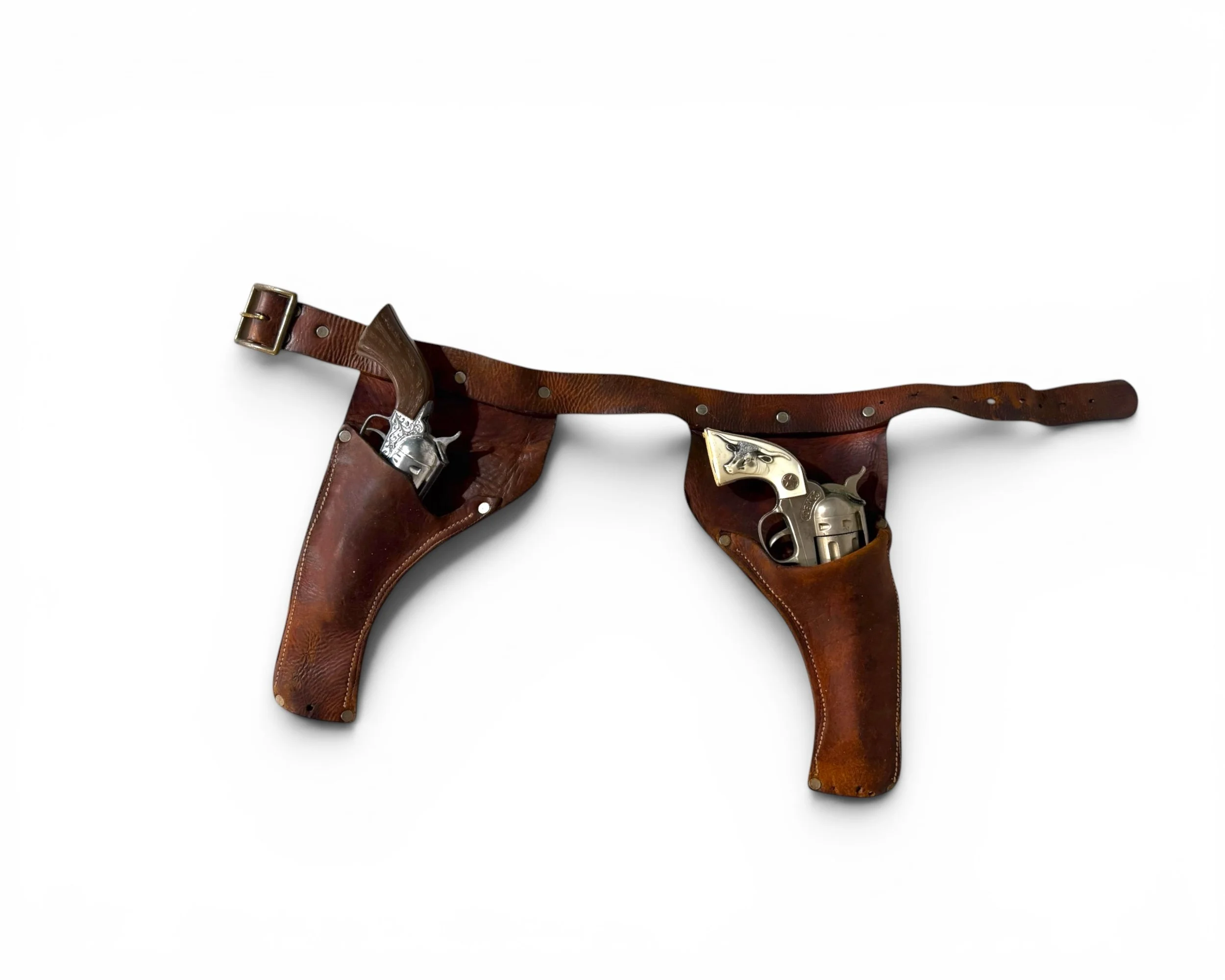 Photoroom_20260610_092920vintage toy guns with leather holster - Modern Artifact Decor.JPG