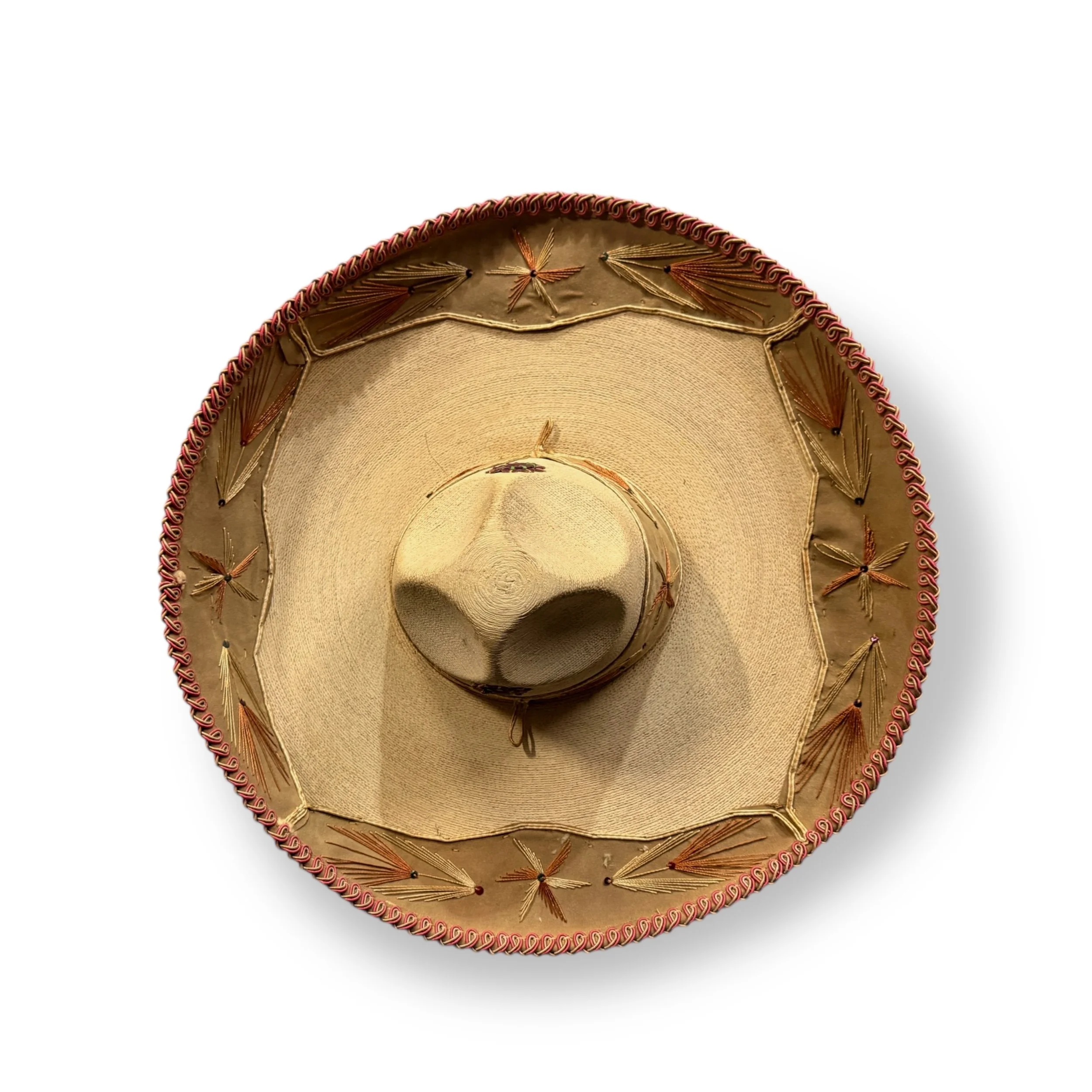 Full top-down view of vintage woven palm sombrero