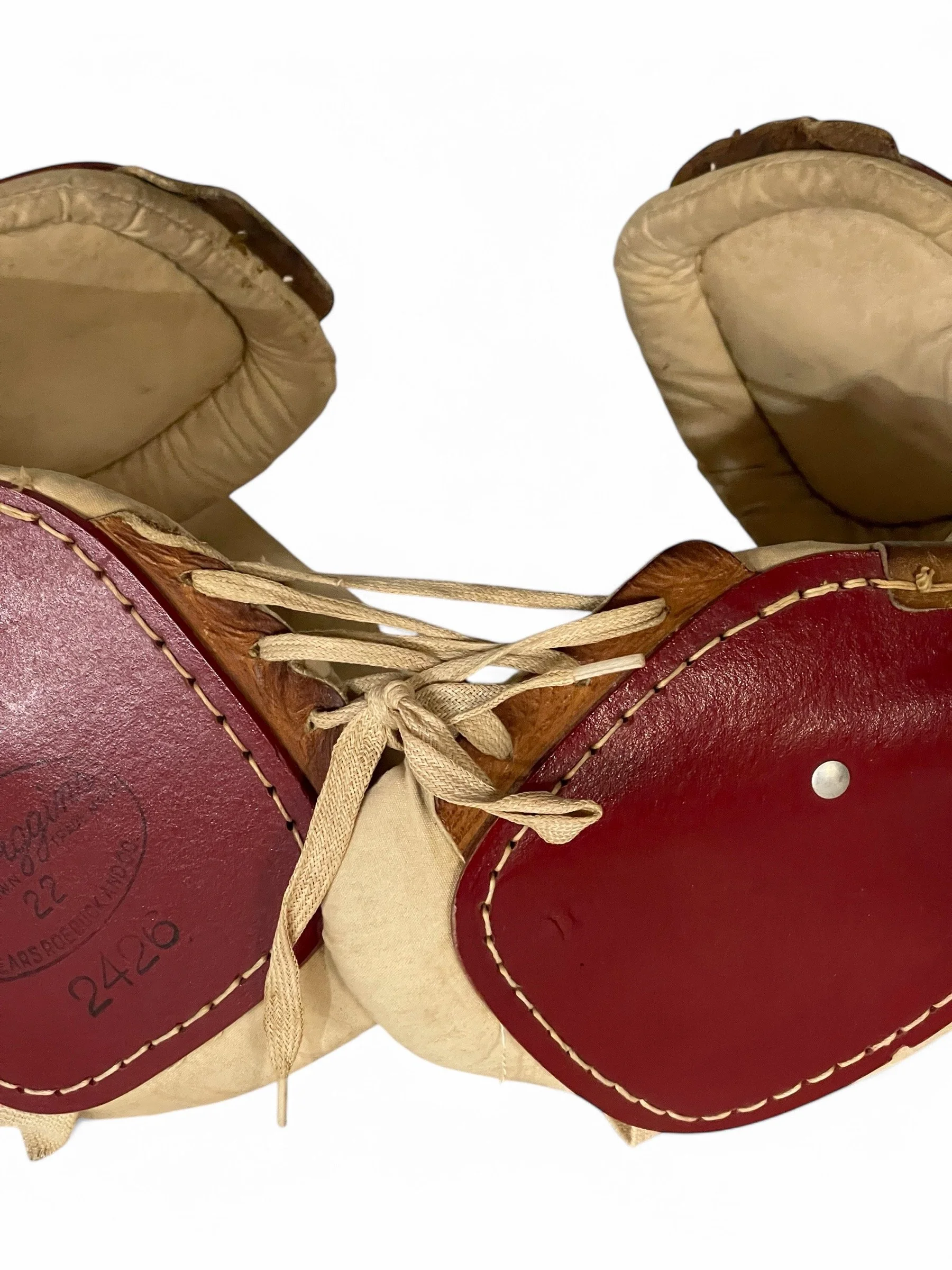 Vintage 1950s set of JC Higgins 2426 youth football pads for decor use in a game room, locker room, or man cave.