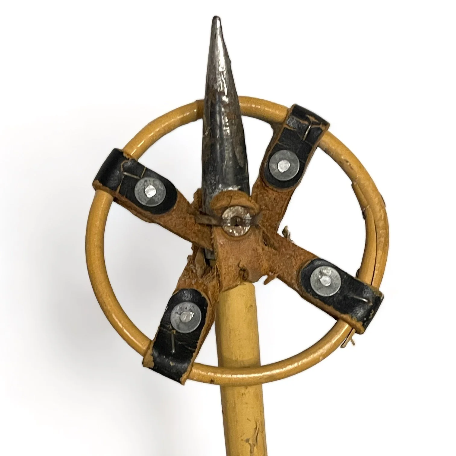 Vintage kids bamboo ski pole, featuring metal tip, bamboo shaft, and bamboo and leather shaft.