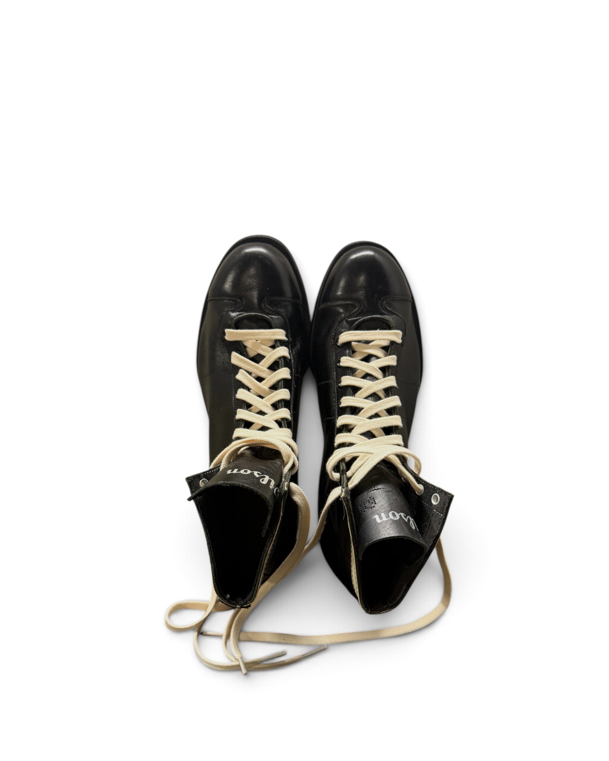 vintage black leather football cleats by Wilson NOS - Modern Artifact DecorPhotoroom_20260815_175130.JPG