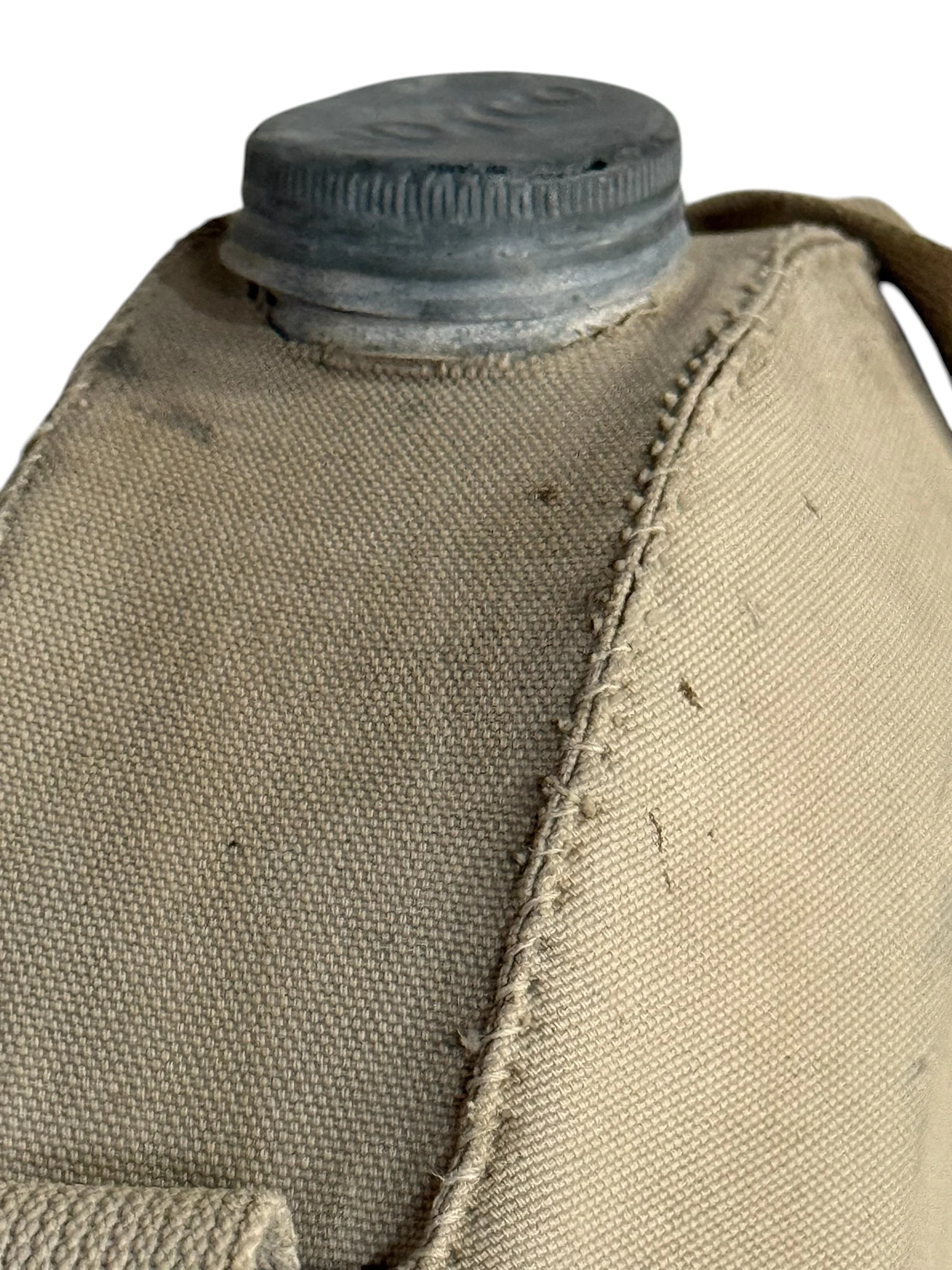 vintage light sand colored canvas galvanized metal canteen for industrial and utility style decor