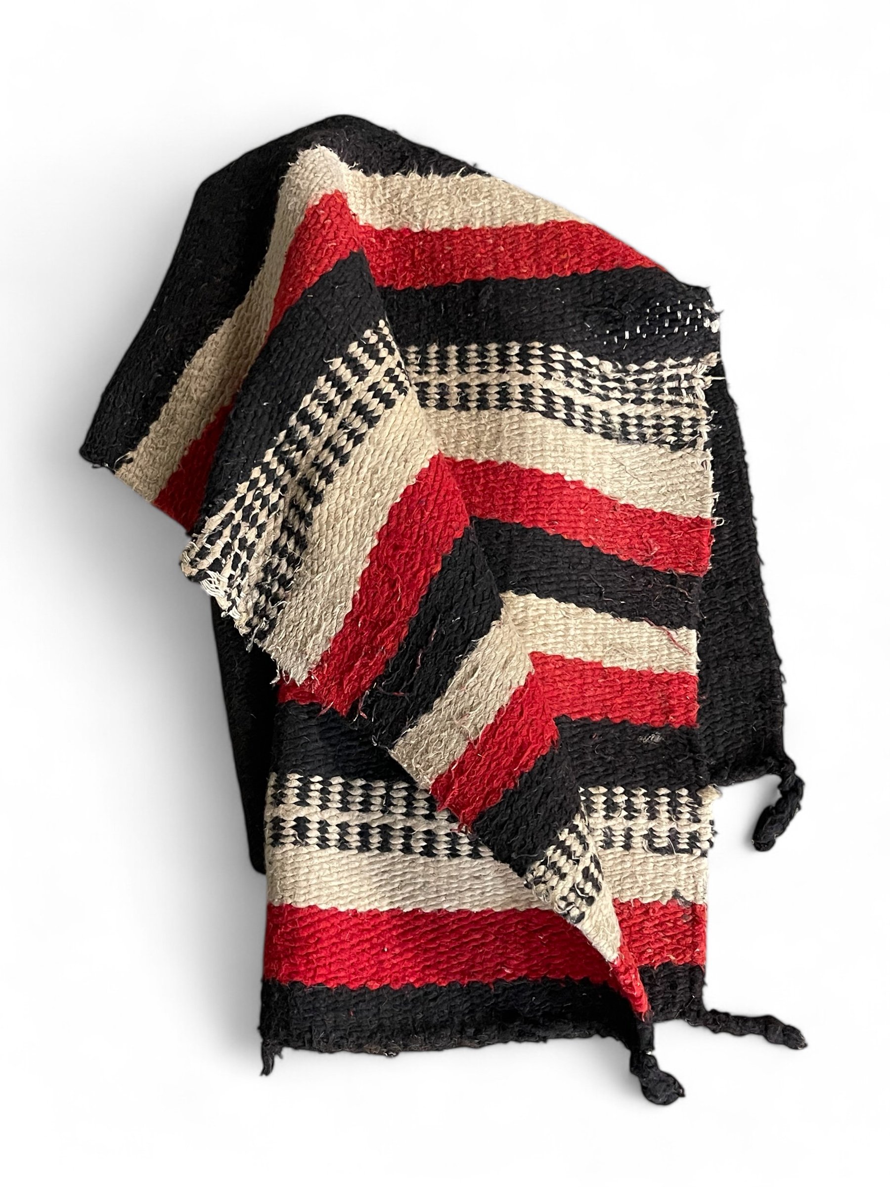 Vintage 31x64 inch Artesanias Rya throw rug, textile, striped horse blanket in solid black with red, beige, black stripes.
