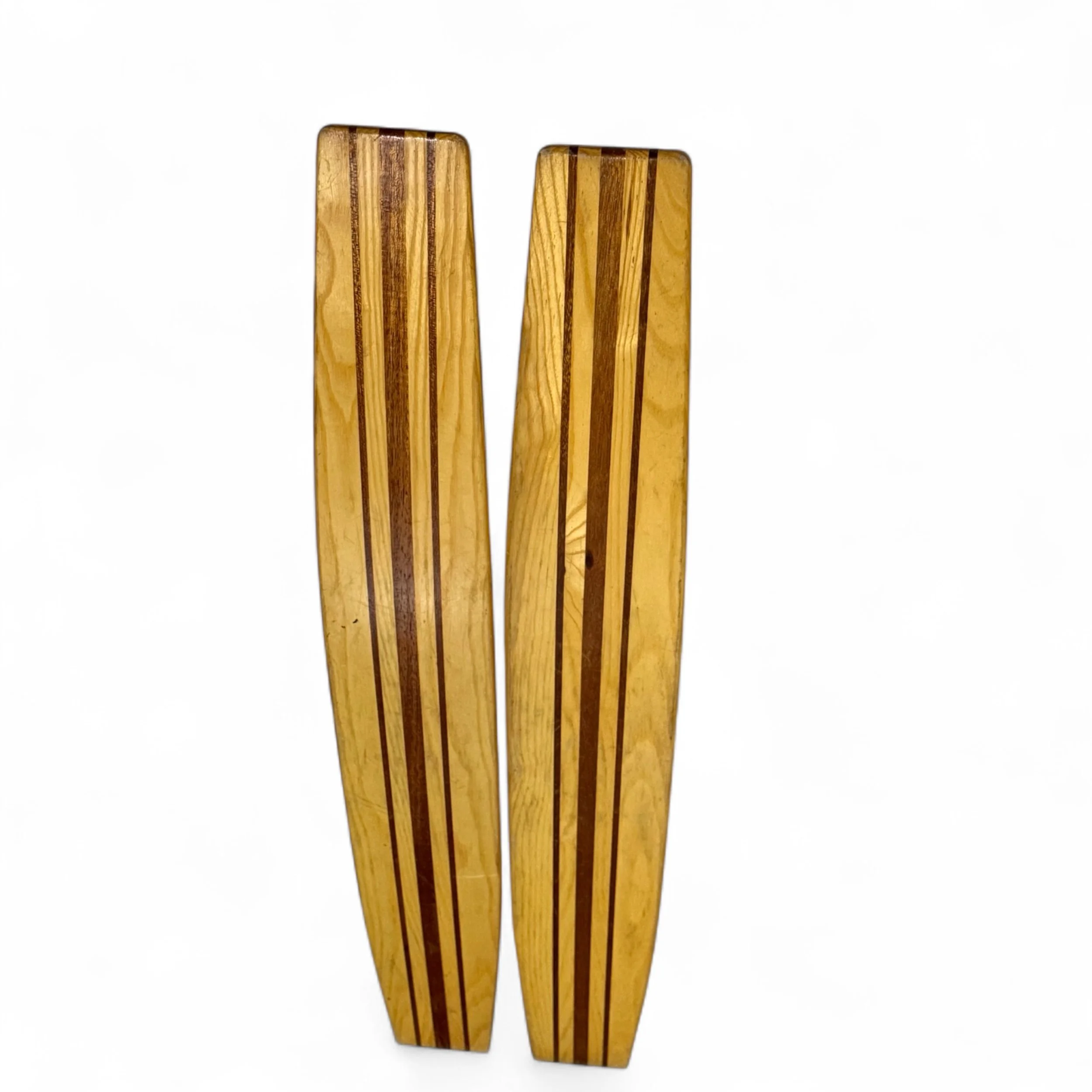 Backside view of a pair of vintage Imperial wooden water skis made of mahogany and ash