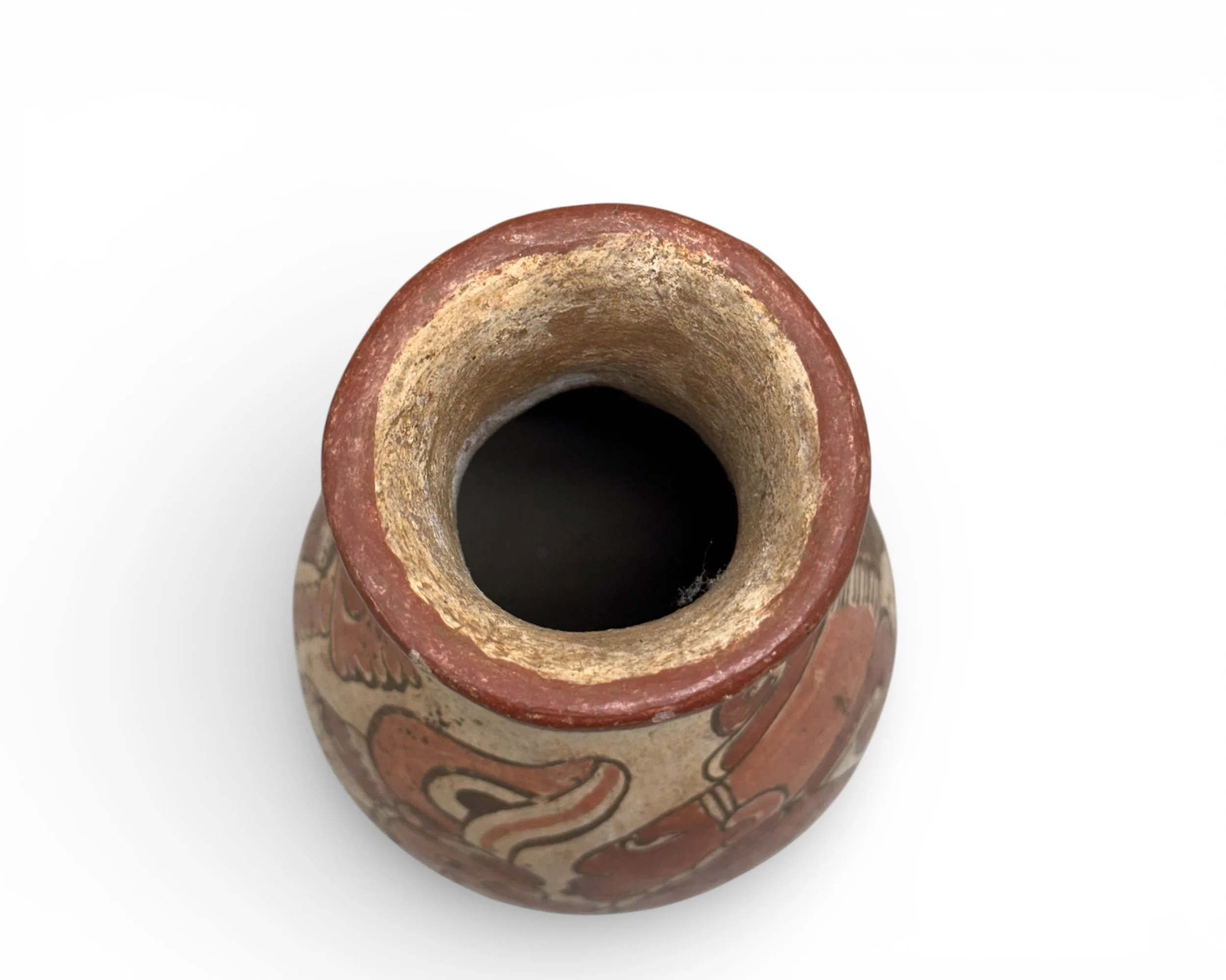 Top view of vintage Mesoamerican inspired ceramic vessel with narrow neck