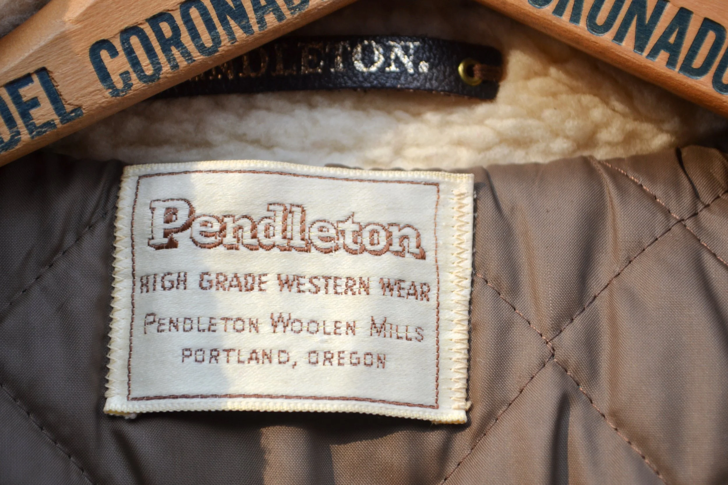 Vintage 1970s men's Pendleton wool and sherpa jacket with classic ranch style, button front closure, fully lined, front pockets, and wester yoke detailing.