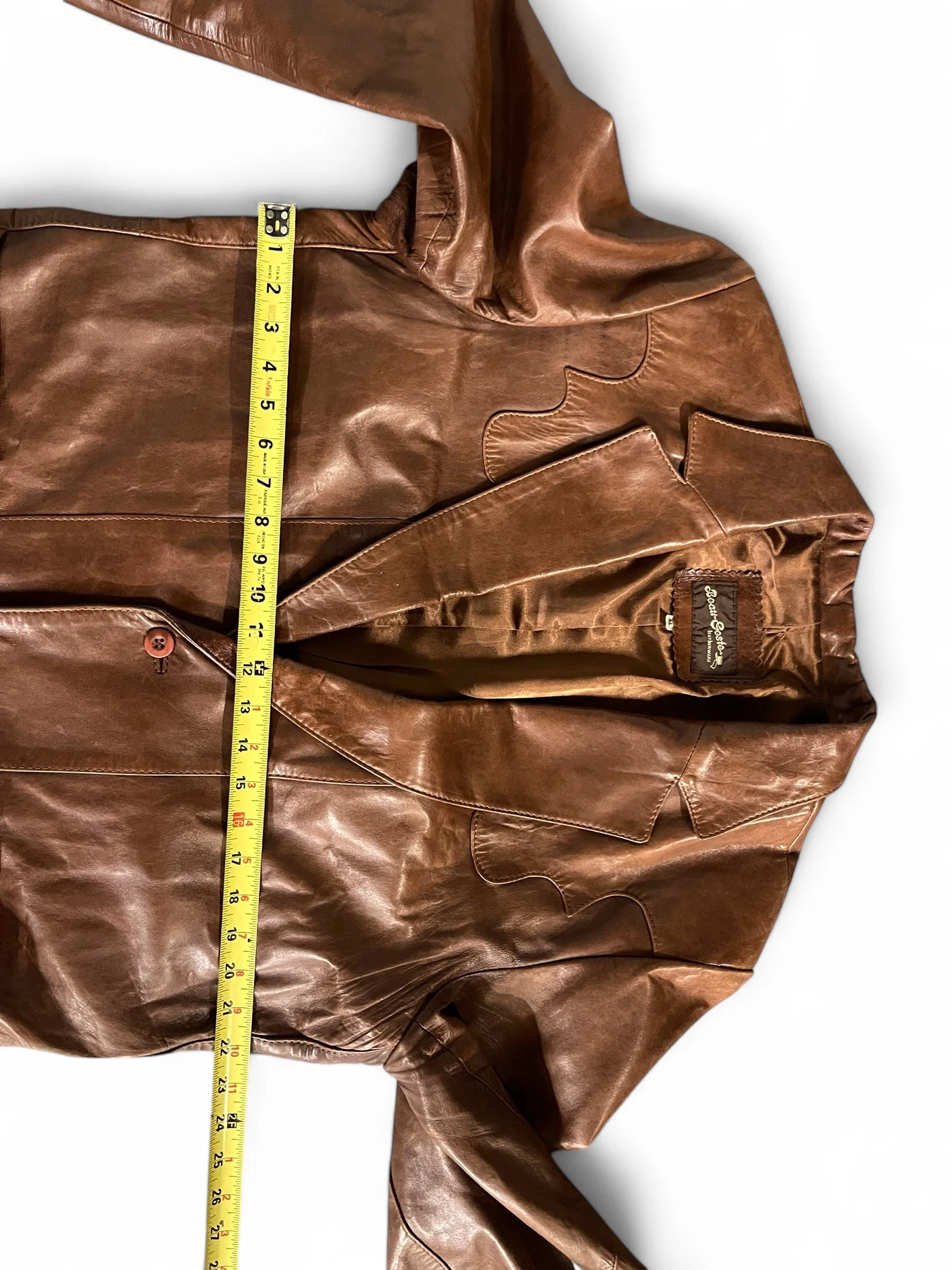 1970s vintage mens brown leather jacket, crafted by Beau-Geste Leatherware. Western front/back detailing, button front closure. Fully lined. Made in Mexico.