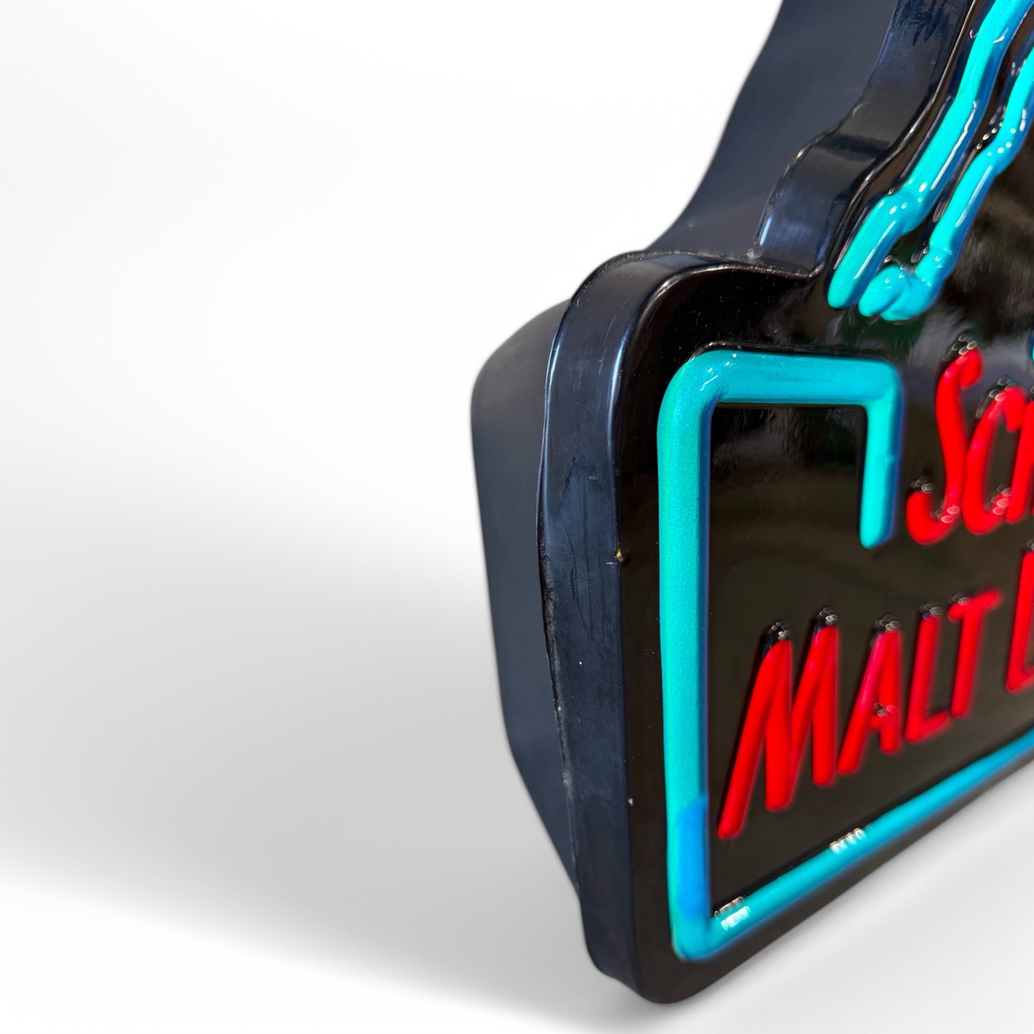 Vintage Schlitz Malt Liquor lighted beer sign with faux neon design, featuring the bull logo. A bold statement piece for home bars, man caves, or breweriana collections.