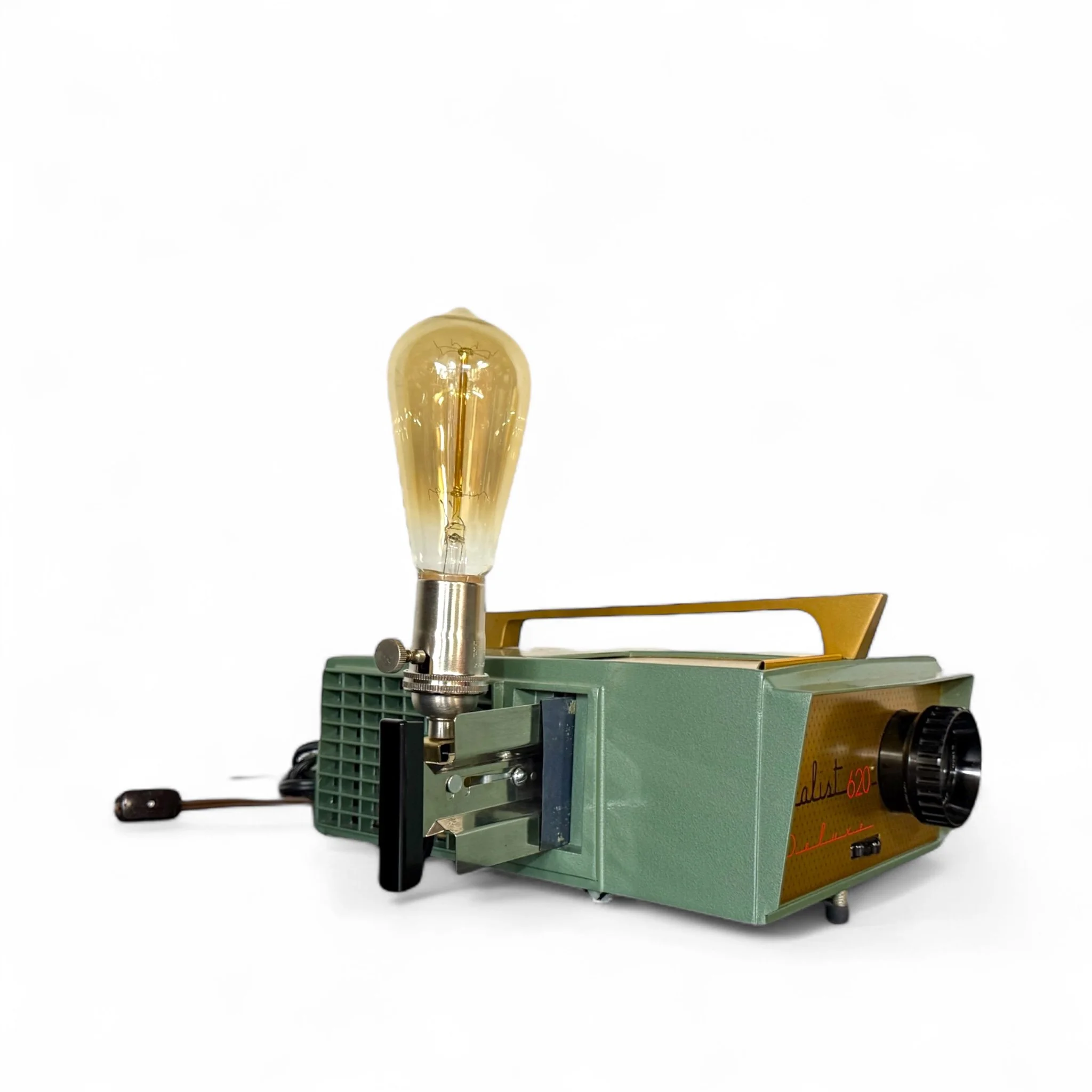Upcycled vintage new old stock Realist slide projector desk lamp with a space age retro mid century modern design. Dual lighting features, and beautiful gold and pearlized sage green color combo.