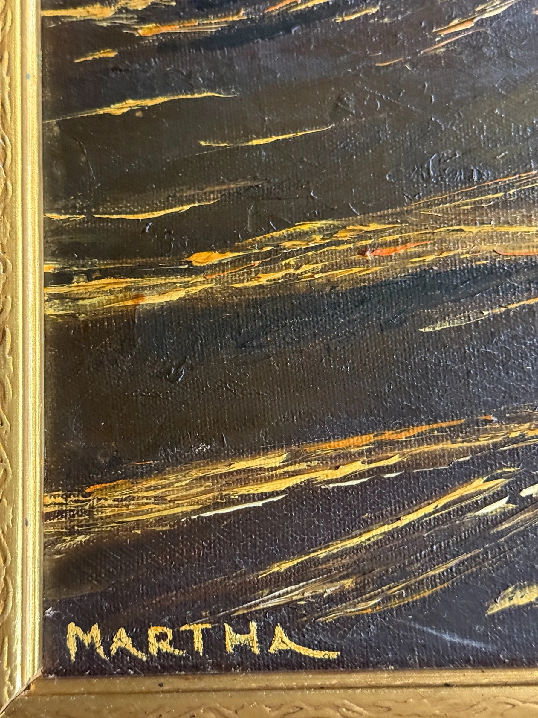 Close-up of artist signature Martha on vintage landscape artwork