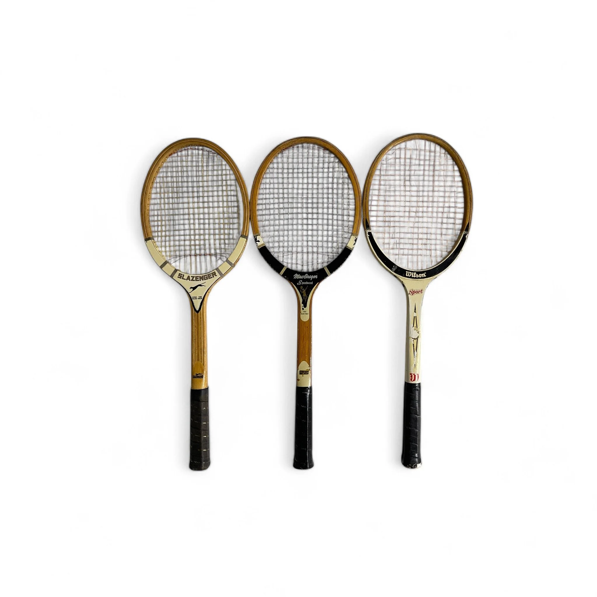 Set of 3 vintage wooden tennis rackets. Set includes MacGregor Speedwood, Slazenger Panther, Wilson Sport. Unique game room wall decor.