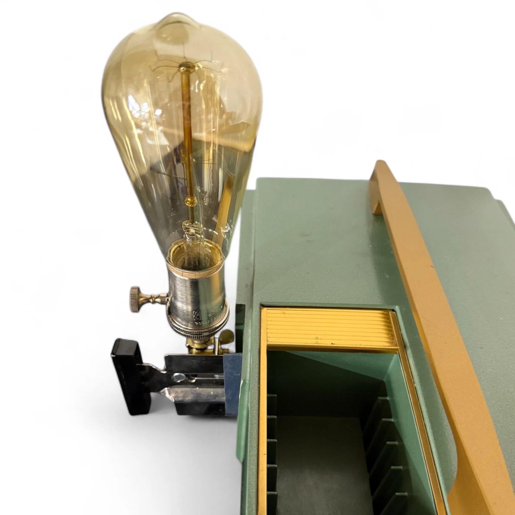 Upcycled vintage new old stock Realist slide projector desk lamp with a space age retro mid century modern design. Dual lighting features, and beautiful gold and pearlized sage green color combo.