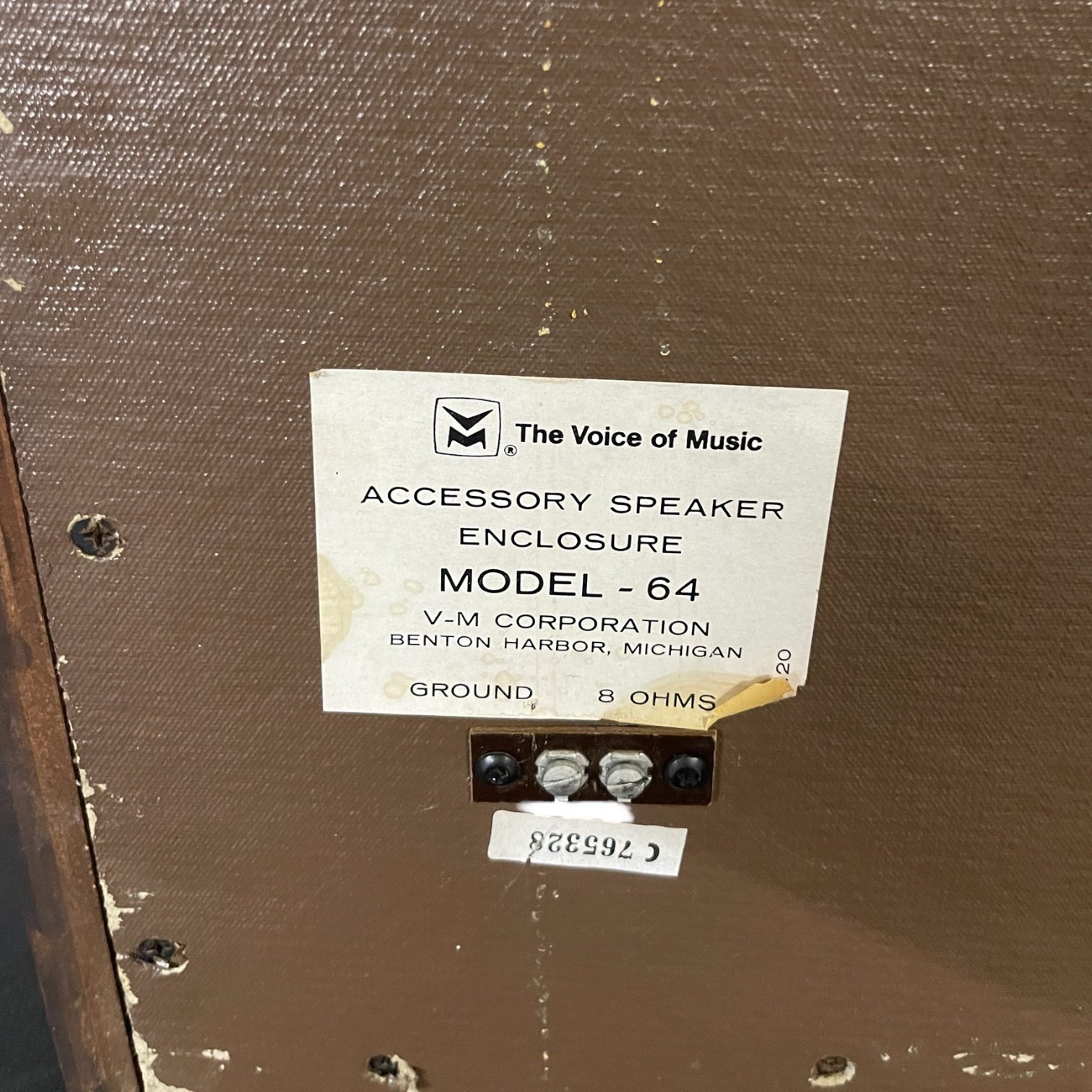 Vintage 1967 pair of wood home audio speakers by The Voice of Music, model 64 with black and orange tweed grill cloth.