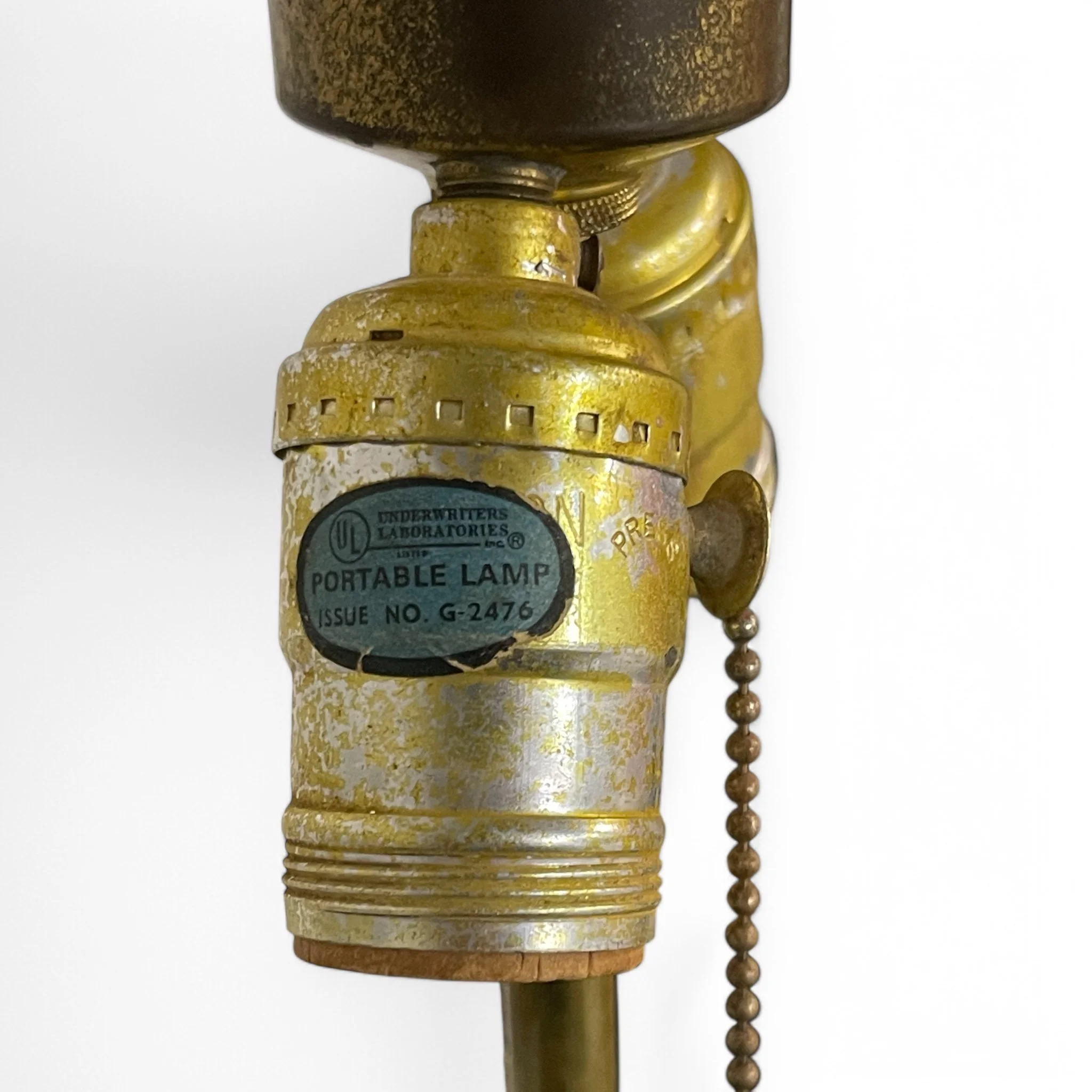 Vintage Japanese Satsuma table lamp with intricate moriage decoration, colorful, hand painted figures in traditional robes, scenic landscape, and a carved wood base.