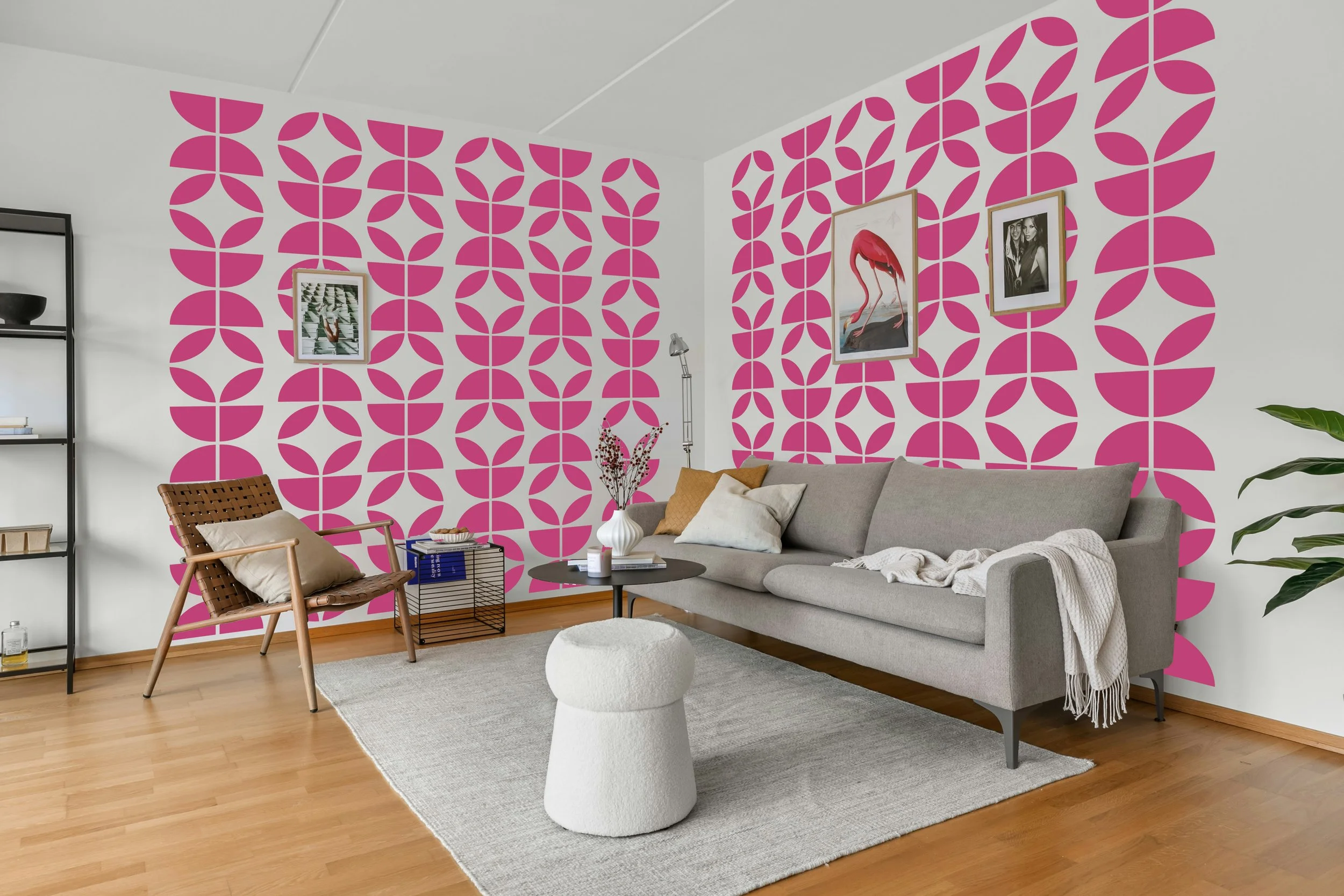 Removable pink vinyl wall decal with retro Scandinavian-inspired botanical pattern in living room.
