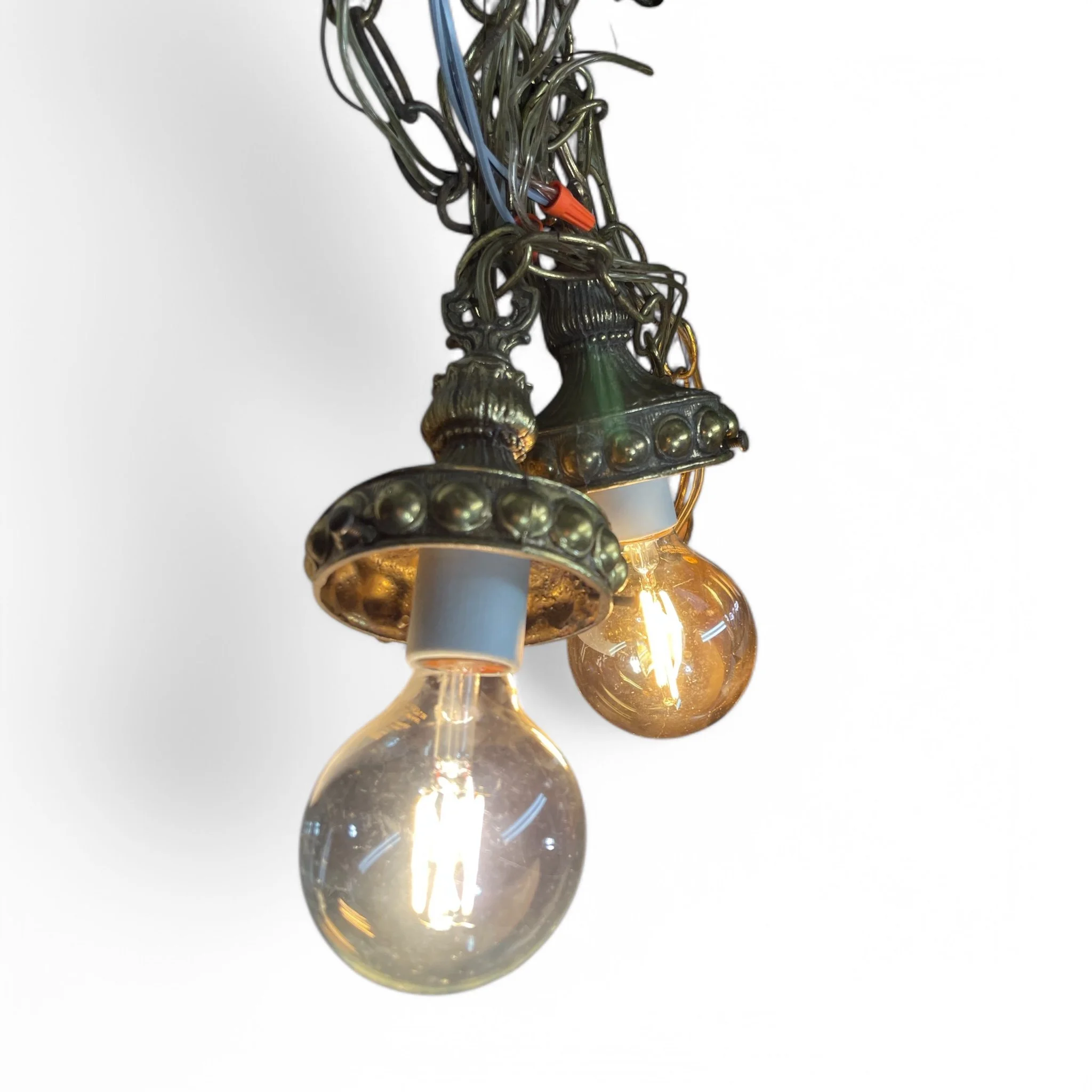 Pair of vintage faceted glass pendant swag lights with gold chains and shared canopy, hardwired, perfect for glam, Hollywood Regency, or vintage inspired interiors.