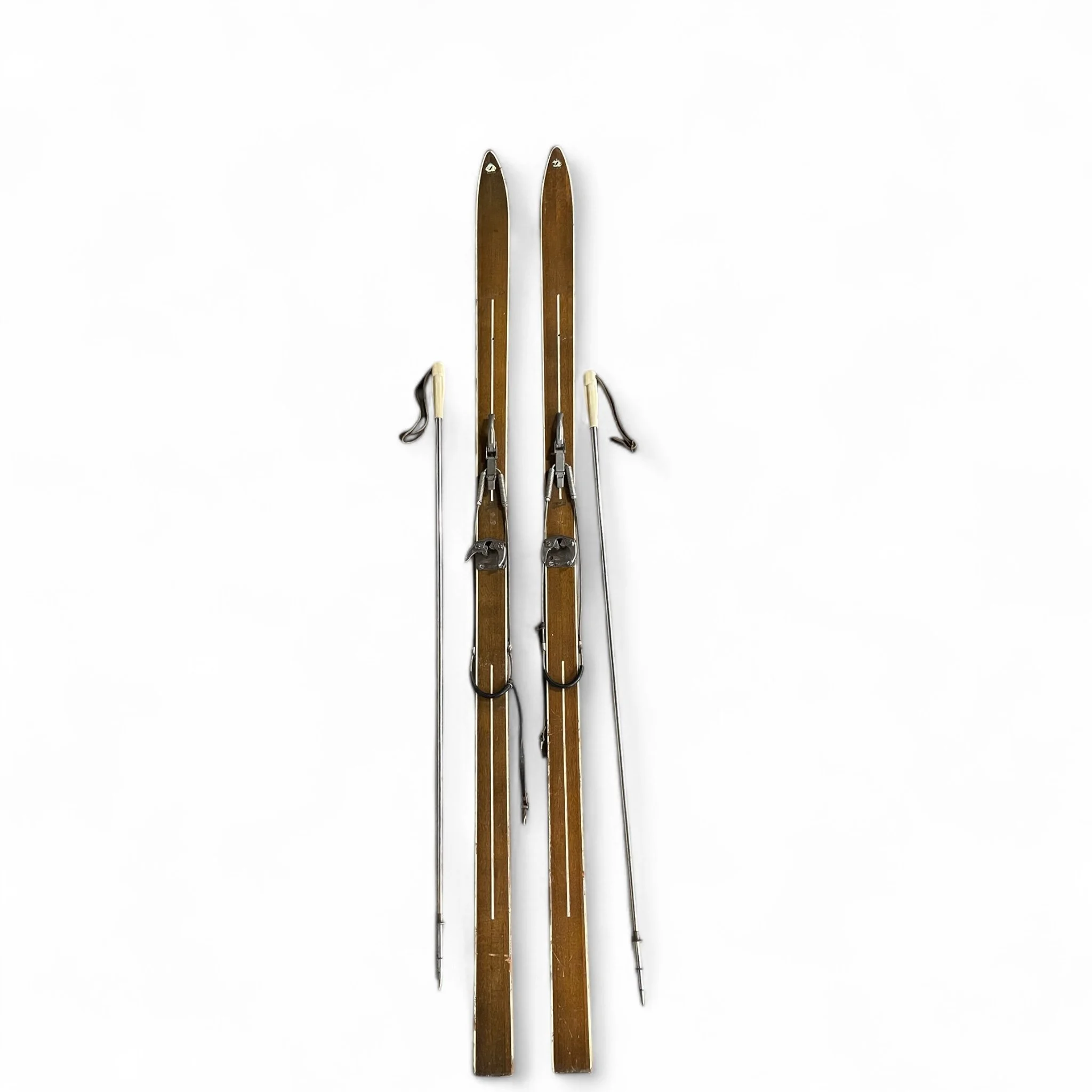 Vintage pair Paris wooden snow skis with metal poles with bakelite handles, leather straps, 80 inches, rustic cabin and lodge style.